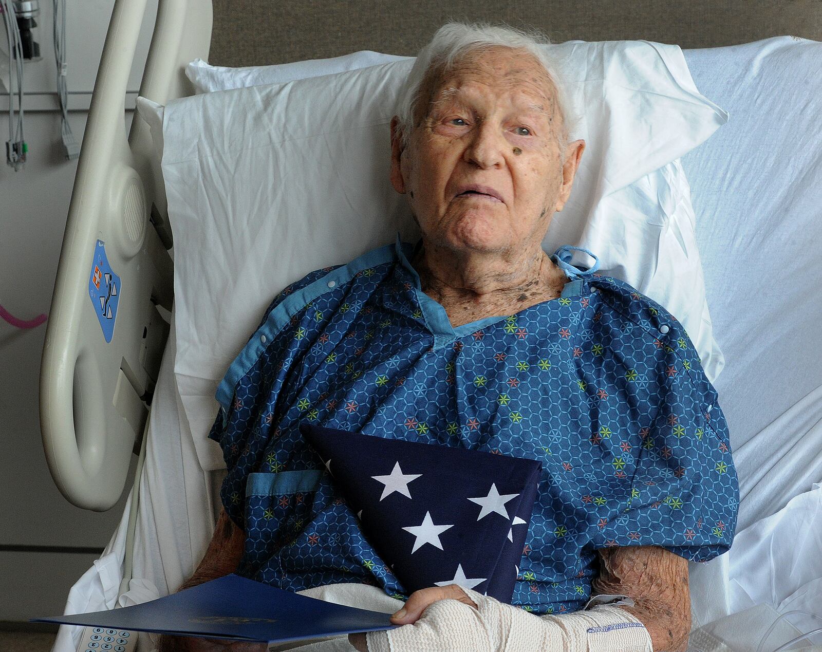 Pearl Harbor Veteran, Elmer Smith, 101, talked to media  before being discharged from Miami Valley Hospital, Friday, May 3, 2024. Smith entered the Army Air Corps at age 18 and fought at Pearl Harbor in December 1941 at Wheeler Field.
 MARSHALL GORBY\STAFF