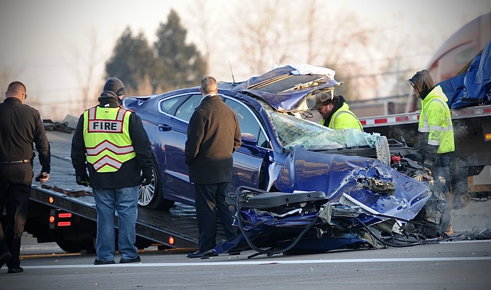 At least one person died following crash involved a car and semi truck on I-75 South near East National Road in Vandalia Wednesday, Dec. 21, 2022. MARSHALL GORBY / STAFF