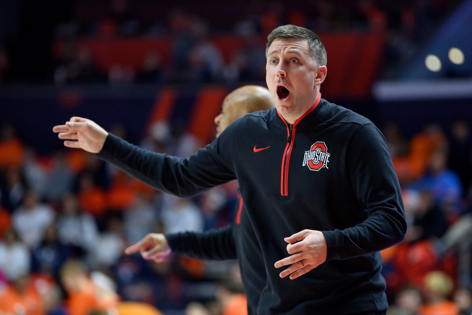 Ohio State head coach Jake Diebler reacts to a play during the first half of an NCAA college basketball game against Illinois, Sunday, Feb. 2, 2025, in Champaign, Ill. (AP Photo/Craig Pessman)