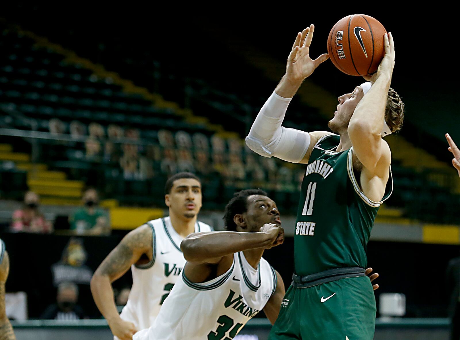 Wright State guard center Loudon Love tries to score against Cleveland State forward Deante Johnson during a Horizon League game at the Nutter Center in Fairborn Jan. 16, 2021. Wright State won 85-49. Contributed photo by E.L. Hubbard