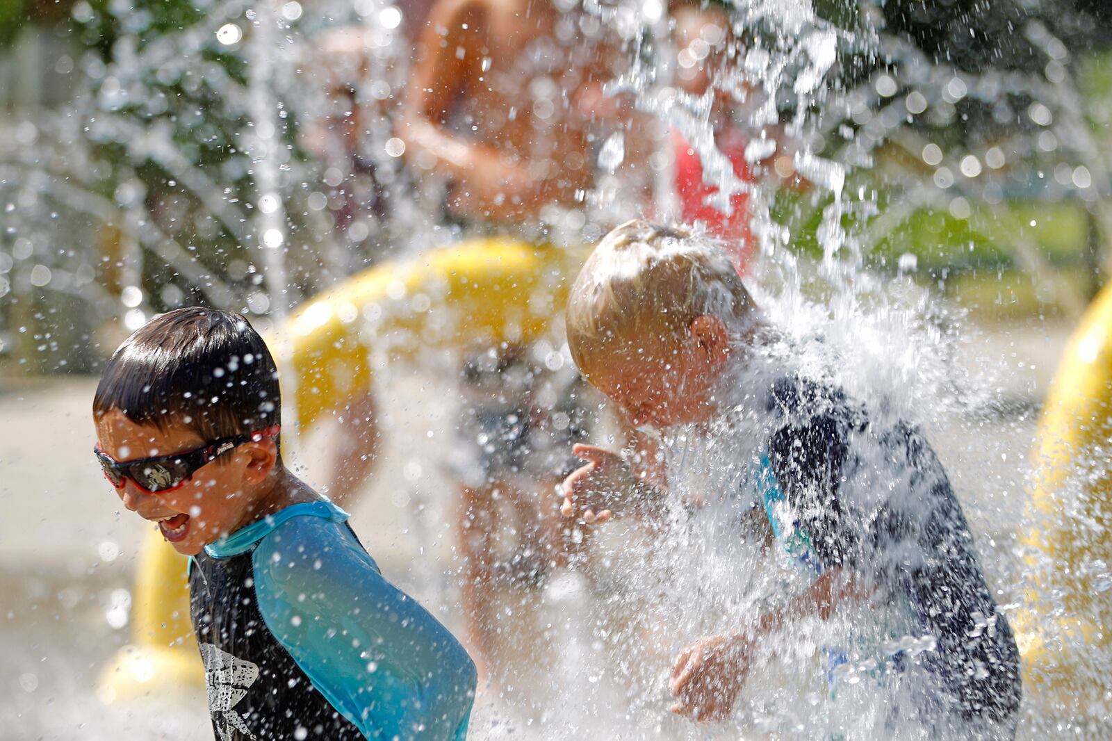 The sprayground at Activity Center Park off North Main Street in Centerville allows children of all ages to have fun getting wet in hot weather. The popular attraction is set to get a $475,000 upgrade in 2024, with Dayton Children's Hospital donating $150,000 toward the renovations. STAFF FILE PHOTO