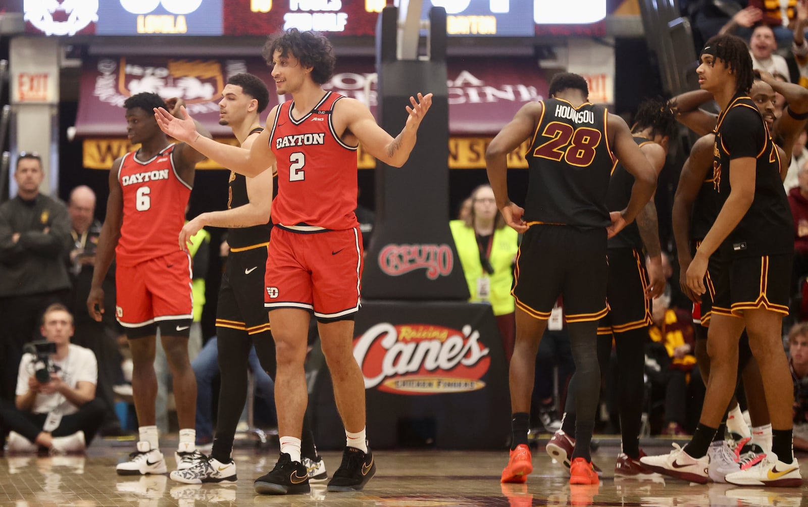 Dayton's Nate Santos protests after being called for a foul in the second half against Loyola Chicago on Friday, Feb. 21, 2025, at Gentile Arena in Chicago. David Jablonski/Staff