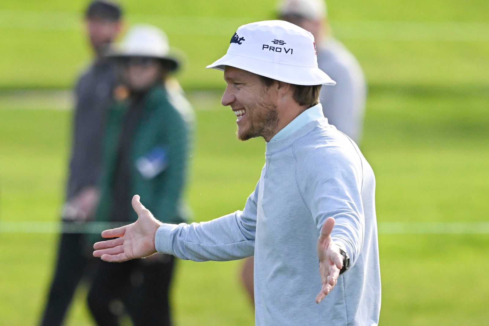 Peter Malnati gestures after hitting an eagle on the first hole of the North Course at Torrey Pines during the first round of the Farmers Insurance Open golf tournament Wednesday, Jan. 22, 2025, in San Diego. (AP Photo/Denis Poroy)