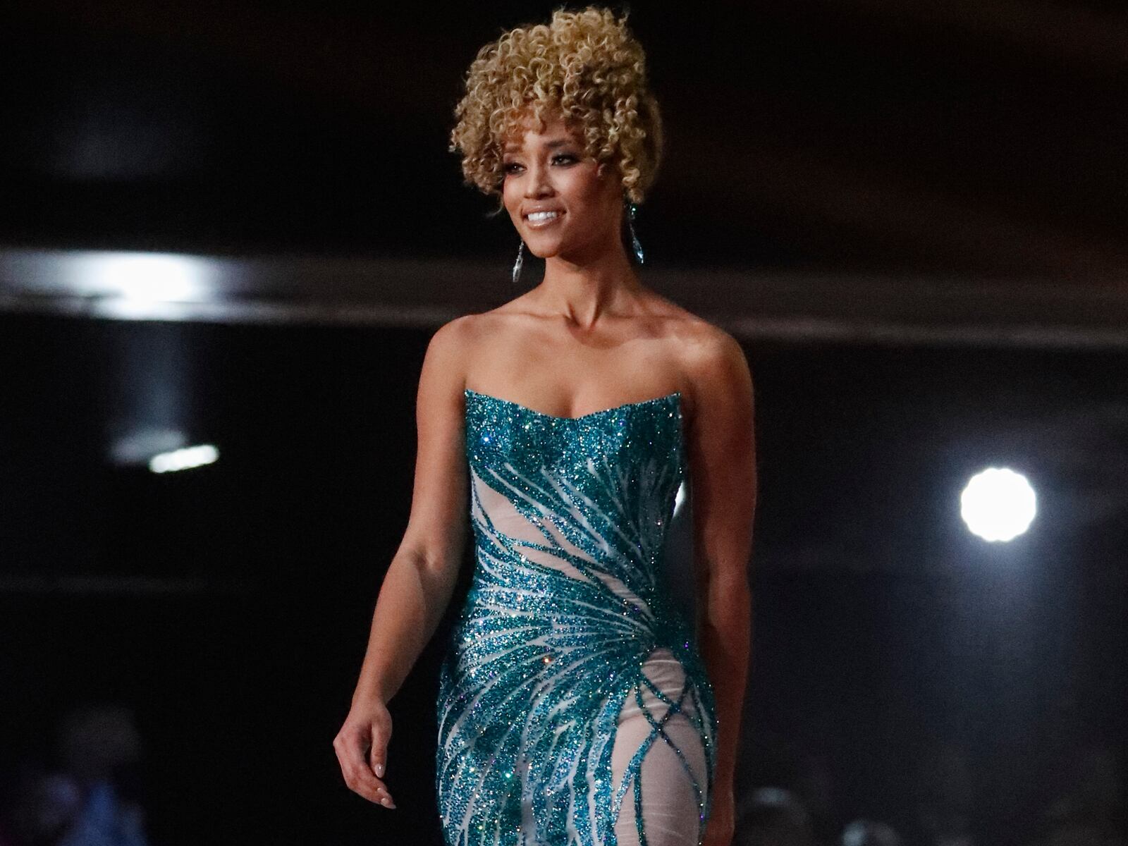 USA's Elle Smith participates in the evening gown stage of the 70th Miss Universe pageant, Monday, Dec. 13, 2021, in Eilat, Israel. (AP Photo/Ariel Schalit)