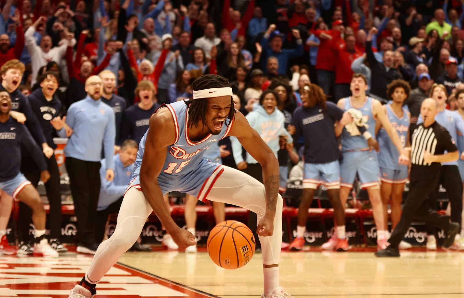 Dayton's DaRon Holmes II reacts after a dunk against Saint Louis on Tuesday, Jan. 16, 2024, at UD Arena. David Jablonski/Staff