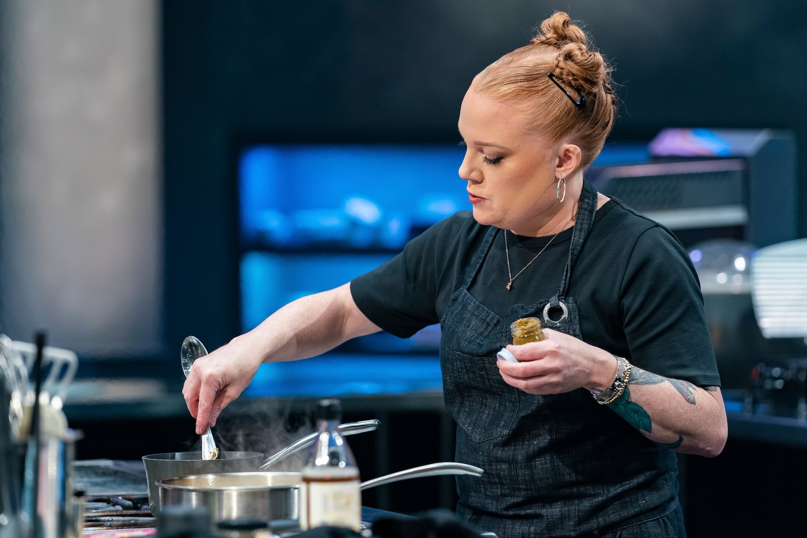 This image released by Warner Bros. Discovery shows contestant Tiffani Faison competing during season three of Food Network's "Tournament of Champions". (Anders Krusberg/Warner Bros. Discovery via AP)