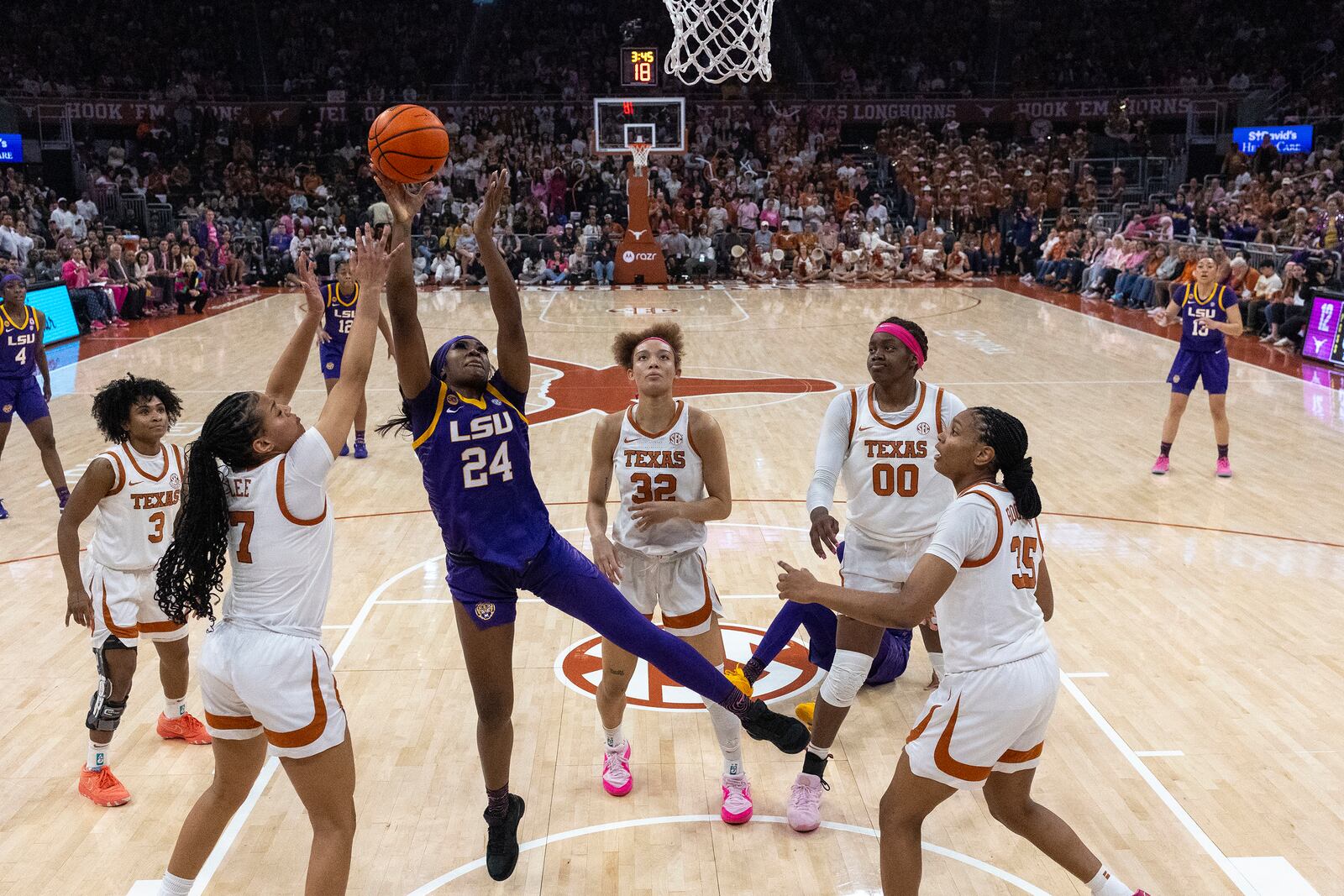 LSU guard Aneesah Morrow (24) reaches for the rebound against Texas during the first half of an NCAA college basketball game in Austin, Texas, Sunday, Feb. 16, 2025. (AP Photo/Stephen Spillman)