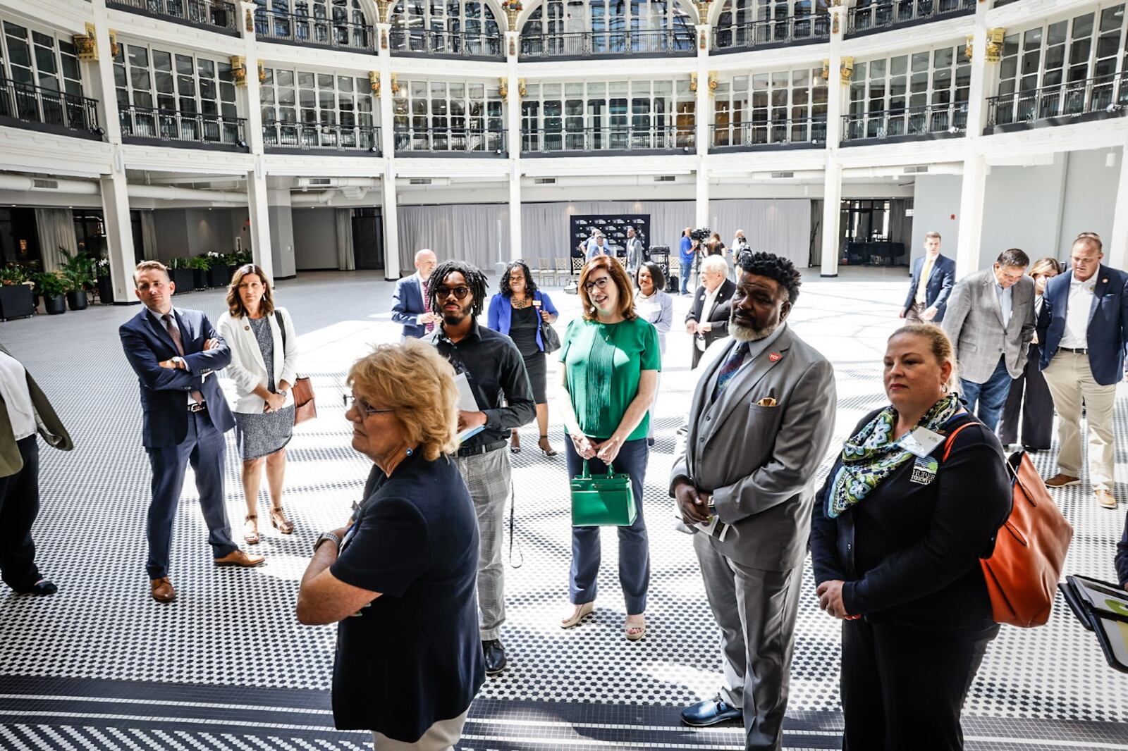 After the press conference, the Ohio Mayors Alliance toured the Dayton Arcade. JIM NOELKER/STAFF