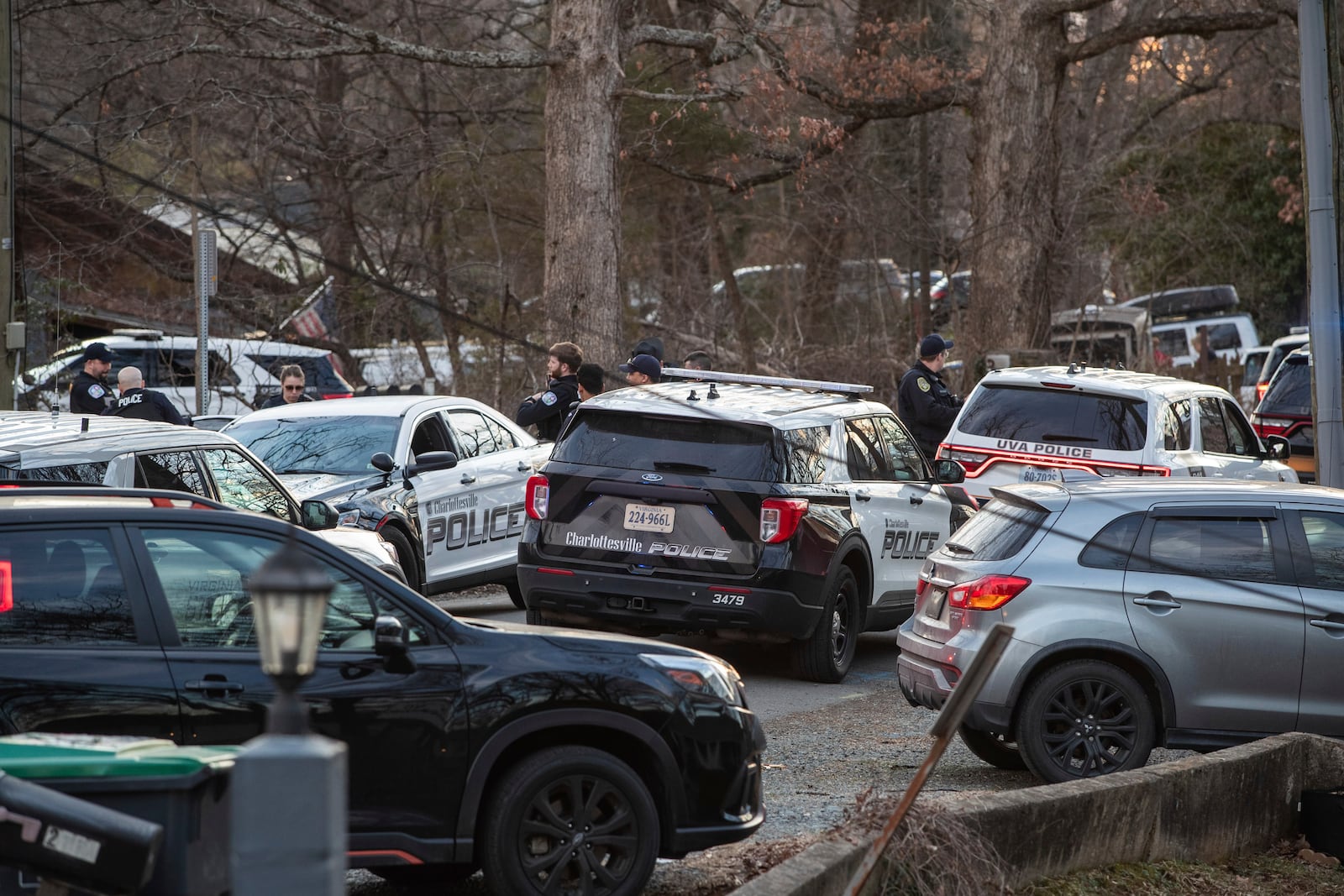 Police cars on Stribling Avenue where they catch and arrest the suspect in the stabbing at on the Grounds of the University of Virginia on Thursday, Feb. 27, 2025. (Cal Cary/The Daily Progress via AP)