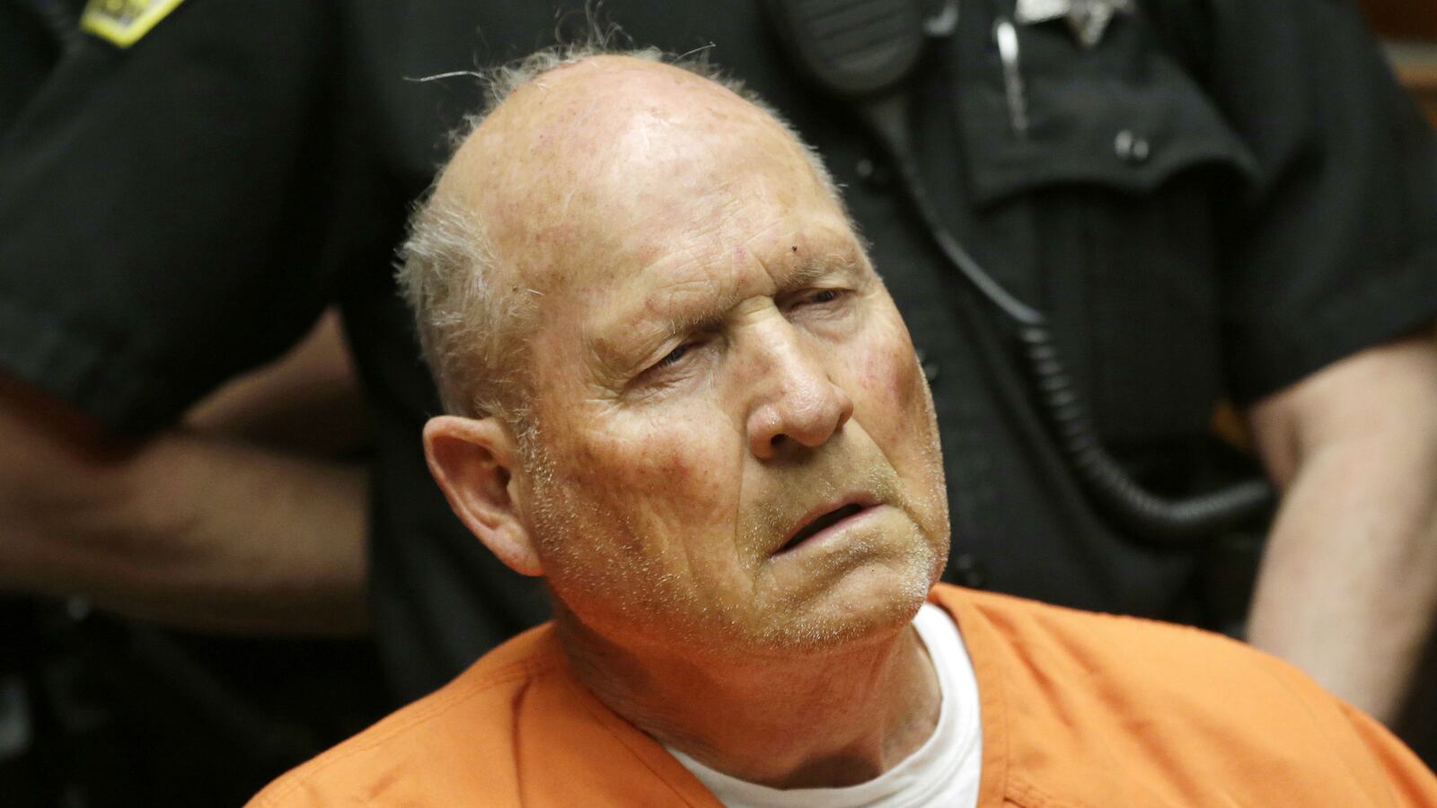 Joseph James DeAngelo Jr., 72, who authorities suspect is the so-called Golden State Killer responsible for at least a dozen murders and 50 rapes in the 1970s and 1980s, makes his first appearance, Friday, April 27, 2018, in Sacramento County Superior Court in Sacramento, Calif.