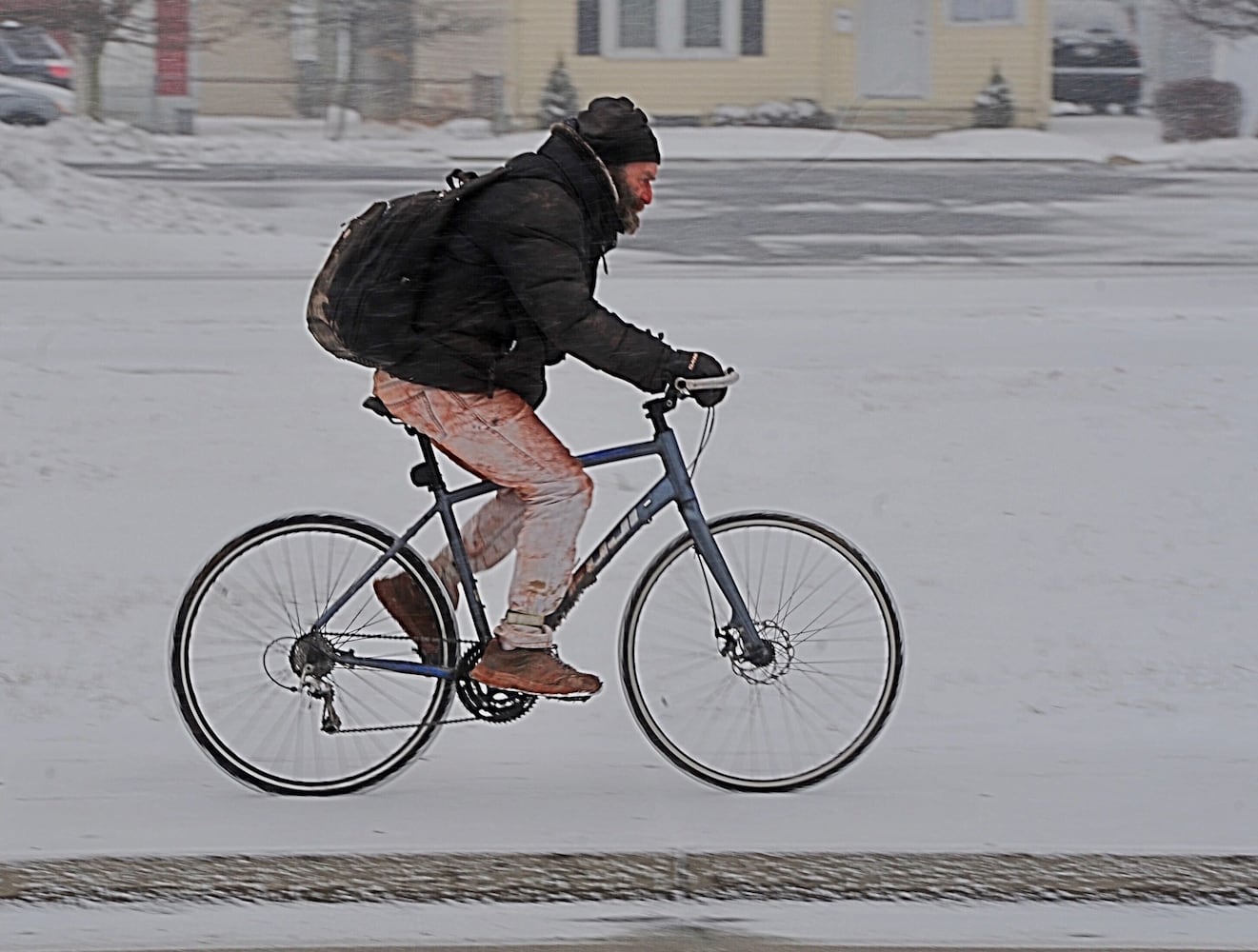 PHOTOS: Snow returns; brutally cold temperature ahead