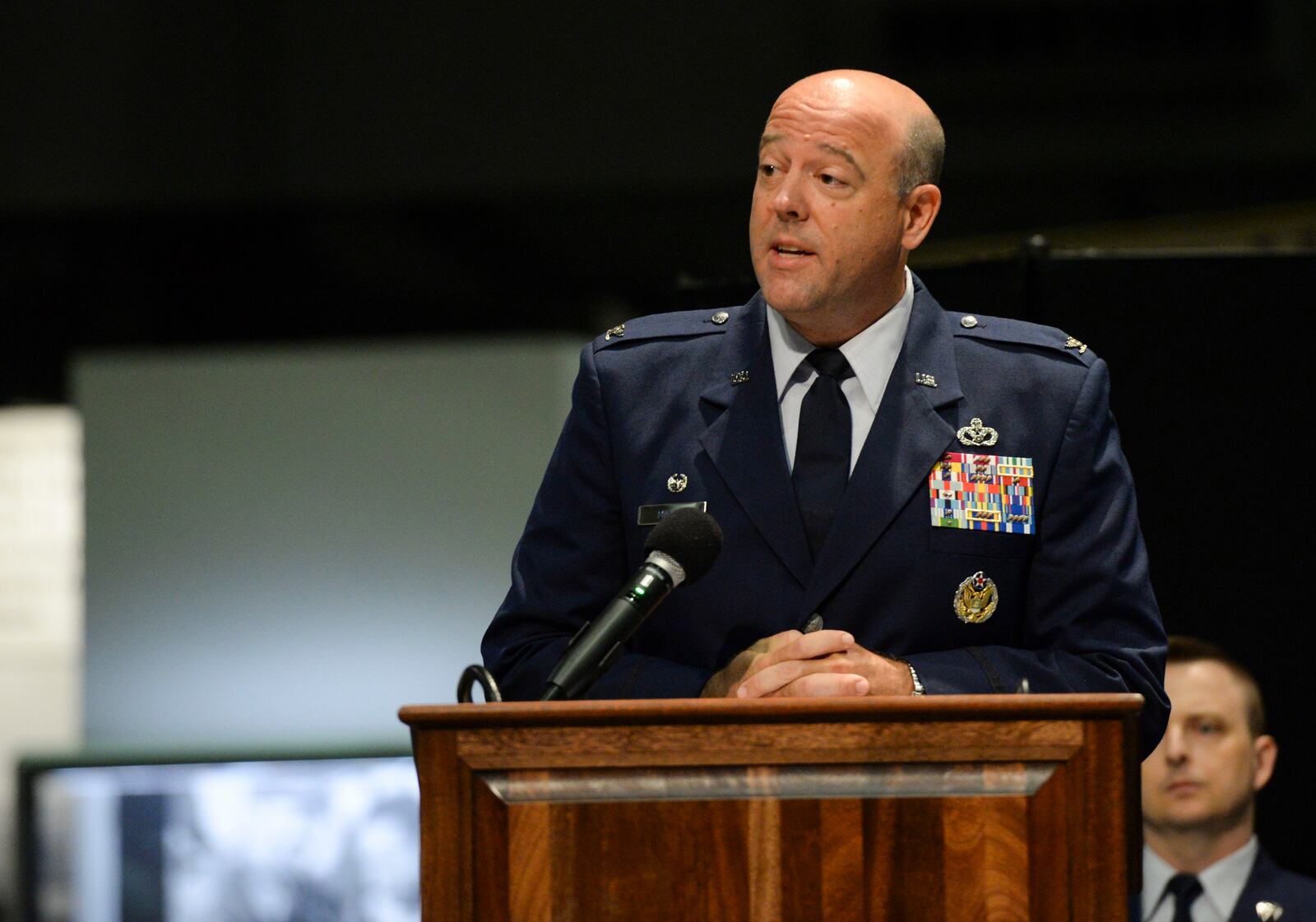 U.S. Air Force Col. Patrick Miller, 88th Air Base Wing commander, delivers remarks after accepting command during a change of command ceremony Friday at the National Museum of the U.S. Air Force. 