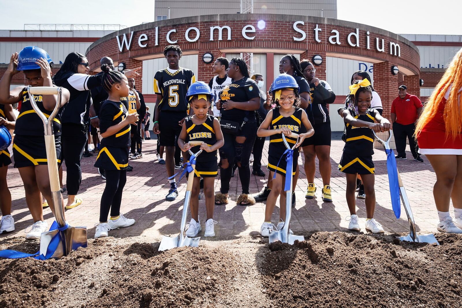 Members for the Meadowdale Wee Lions broke ground on the Welcome Stadium renovation project Wednesday afternoon June 8, 2022. The renovation will upgrade the facility, replace the track and field, improve accessibility. JIM NOELKER/STAFF