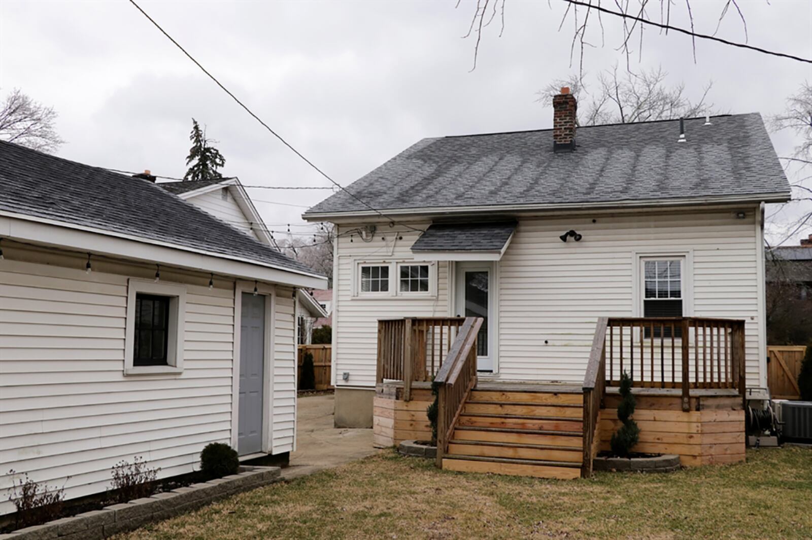 Two exit doors are off the kitchen. One opens to the extended driveway to the side of the house, and the other opens to the rear wooden deck and fenced back yard. CONTRIBUTED PHOTO BY KATHY TYLER