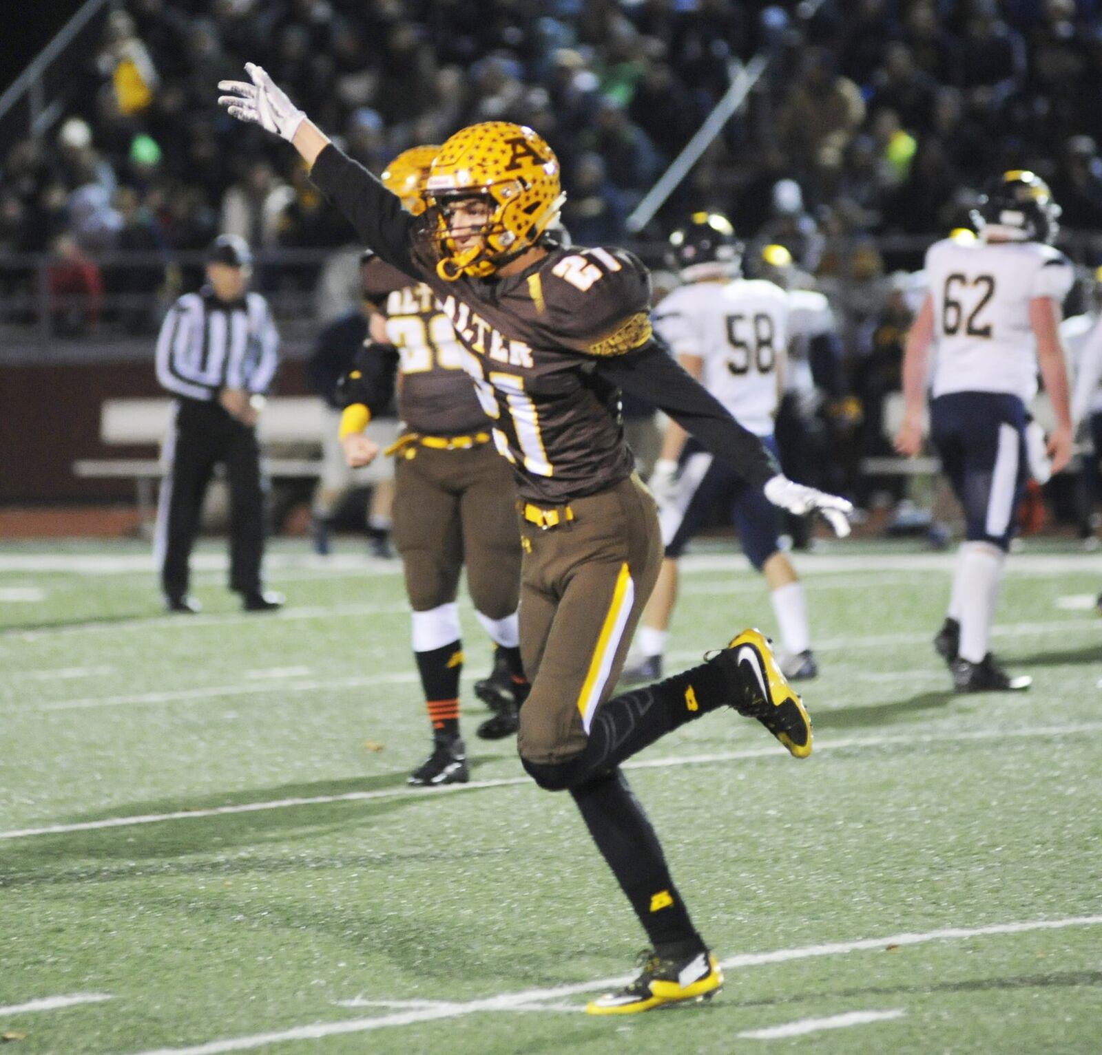 Alter’s Liam Simms celebrates a defensive stop. Alter defeated Norwalk 34-13 in a D-III high school football state semifinal at Wapakoneta on Friday, Nov. 23, 2018. MARC PENDLETON / STAFF