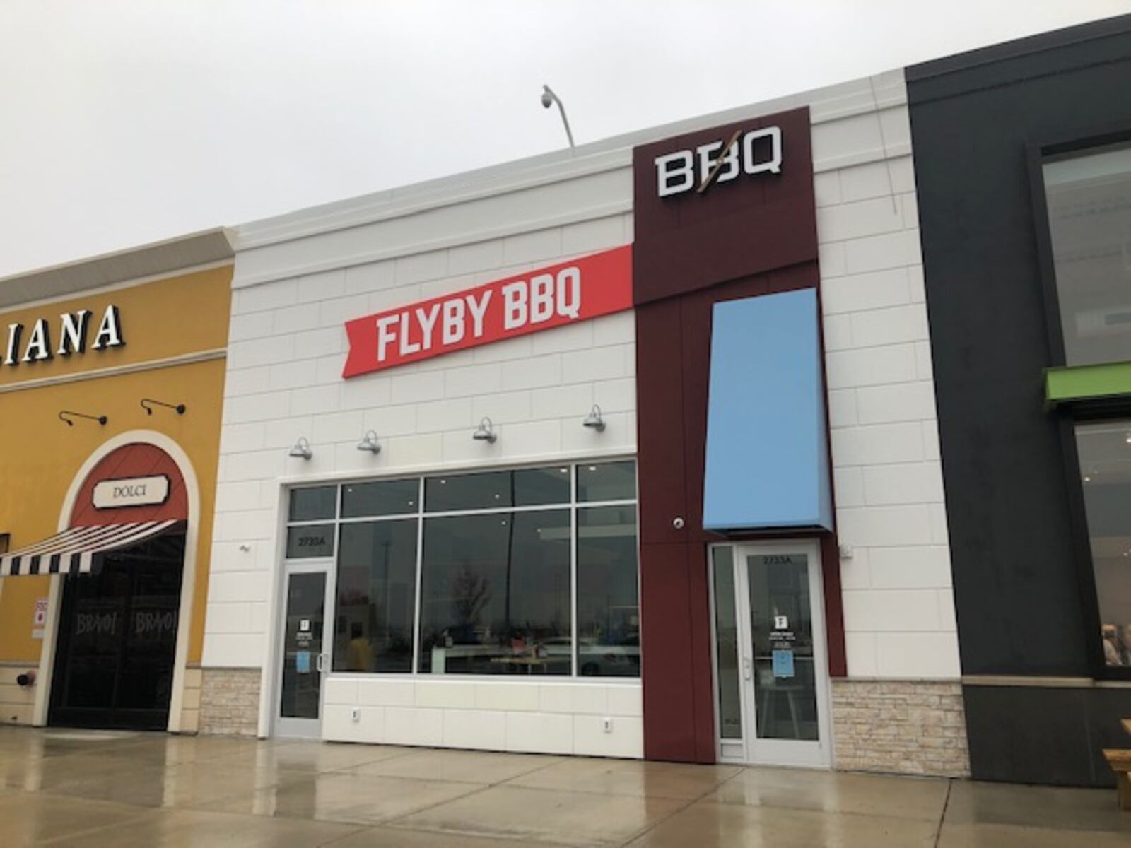 The independent and locally owned Flyby BBQ restaurant will open to the public on Tuesday, Feb. 19, at the Mall at Fairfield Commons, according to its founder, David Butcher. The new restaurant, which got its start as a food truck, is located between Fusian and Bravo Cucina Italiana near the mall’s front entrance. MARK FISHER / STAFF PHOTO