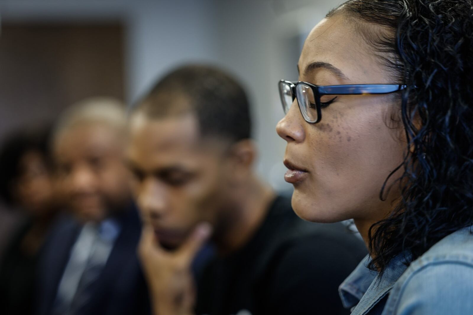 Taneshia Lindsay, right and Robert Tootle, center, react to questions from the media about their nonverba, autistic son, Braylen, who was hit in the head by a former DPS employee, at attorney Michael Wright office in downtown Dayton Tuesday, July 23. The family is pursuing a lawsuit against the school system and former employee. JIM NOELKER/STAFF