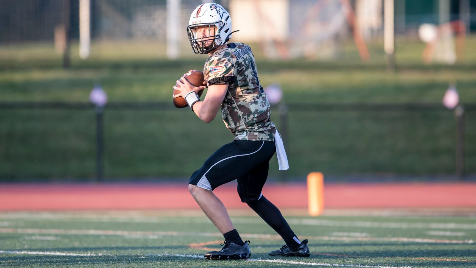 Waynesville High School junior quarterback Alex Amburgy drops back to pass during their game on Thursday night against Oakwood at Spartan Community Stadium. Waynesville won 45-14. CONTRIBUTED PHOTO BY MICHAEL COOPER