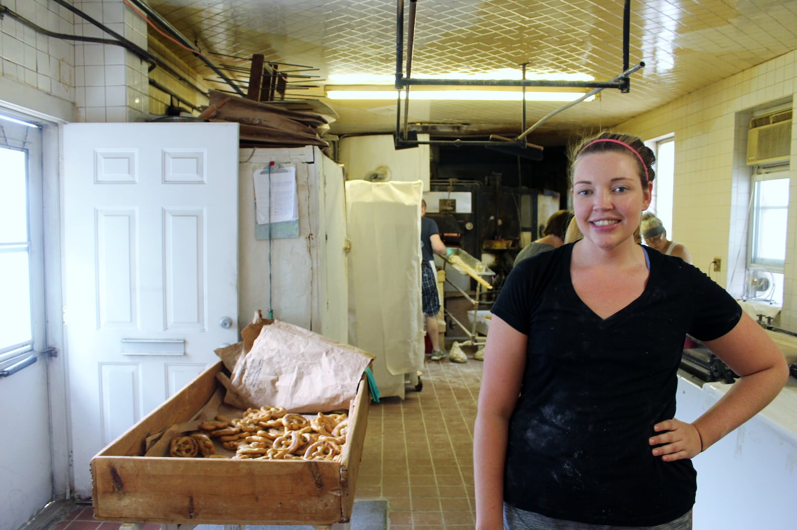 Emma Smales of Smales Pretzel Bakery is investing $35,000 in to a new pretzel rolling machine. Photo by Amelia Robinson