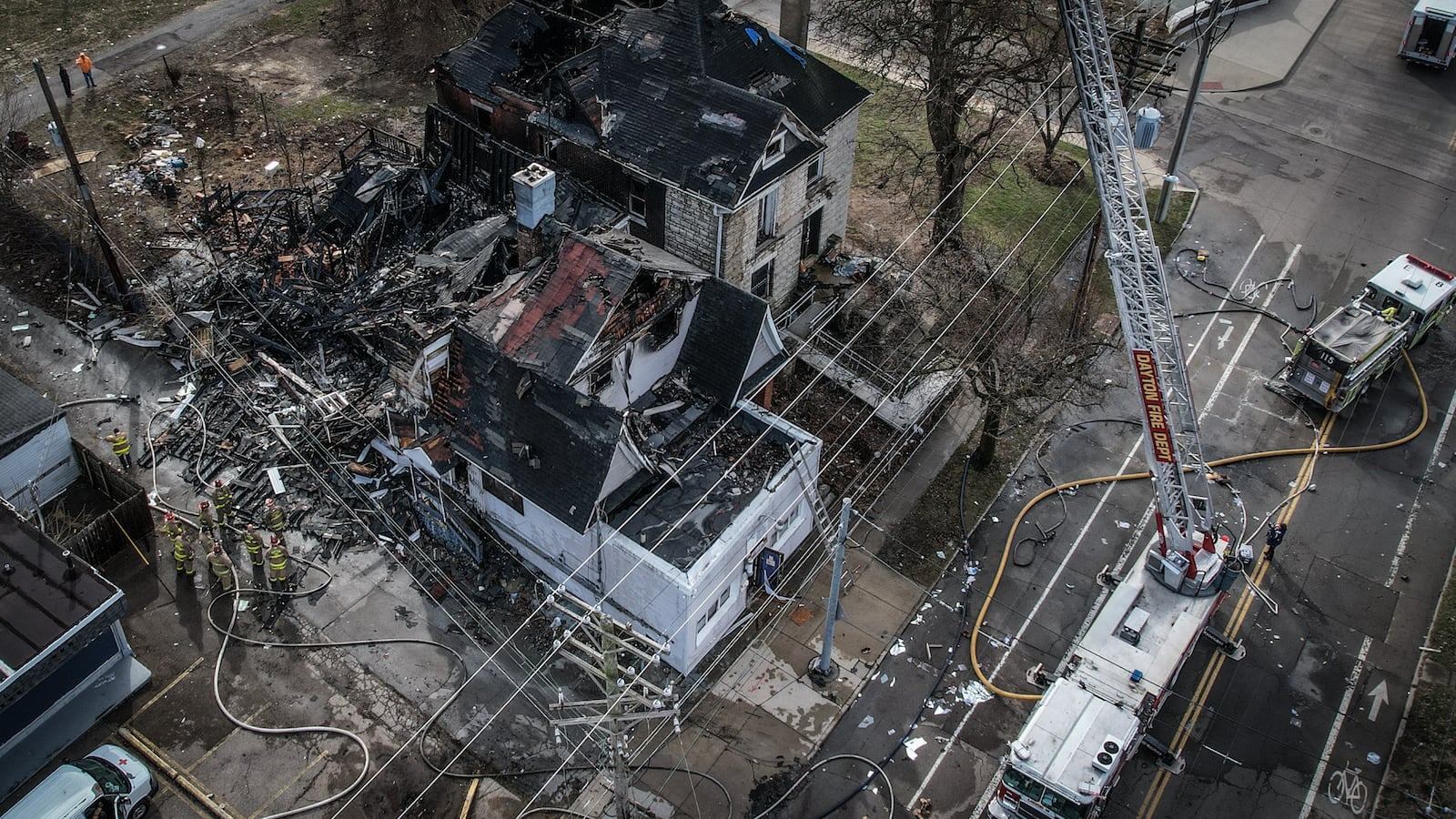 The bodies of five people were discovered in heavy debris in the aftermath of a large fire Wednesday morning, March 8, 2023, at a vacant house in the 500 block of North Broadway Street in Dayton. Crews ordered emergency demolition of two houses destroyed in the fire. A third house was damaged in the massive blaze. JIM NOELKER/STAFF