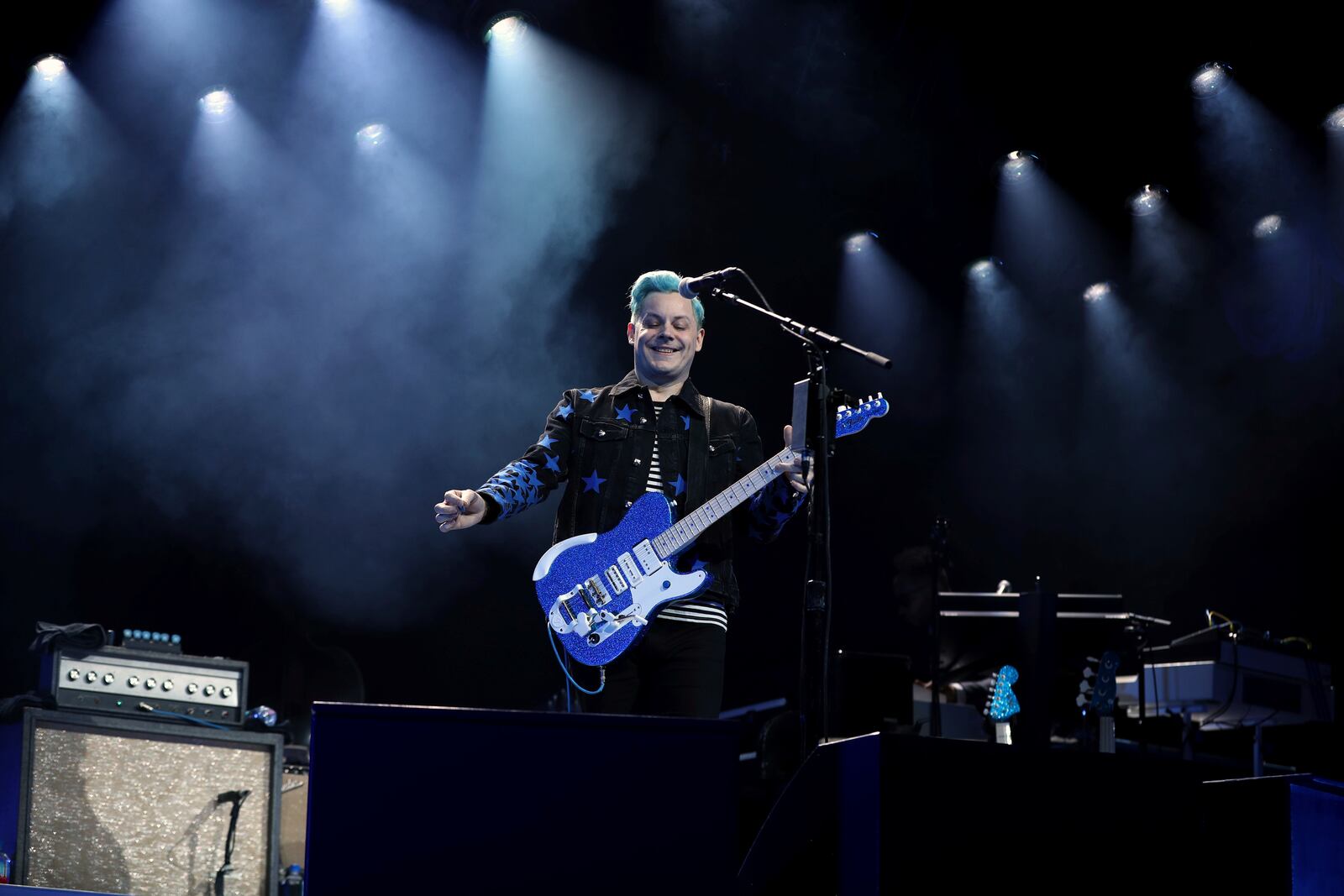 Jack White performs at the Masonic Temple Friday, April 8, 2022, in Detroit. White surprised fans by marrying musician Olivia Jean on stage during his Detroit homecoming show Friday. (Kirthmon F. Dozier /Detroit Free Press via AP)