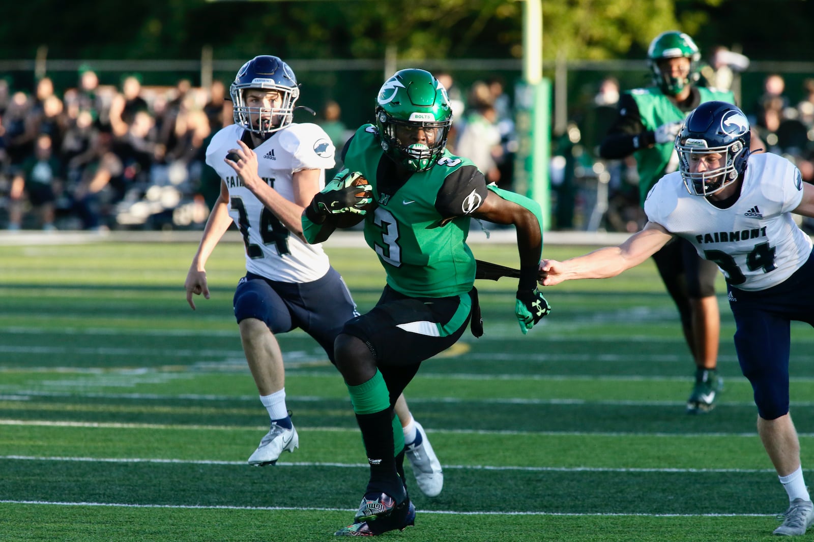 Northmont's Dalin Wilkins runs after a catch against Fairmont on Friday, Sept. 9, 2022, at Premier Health Stadium in Clayton. David Jablonski/Staff