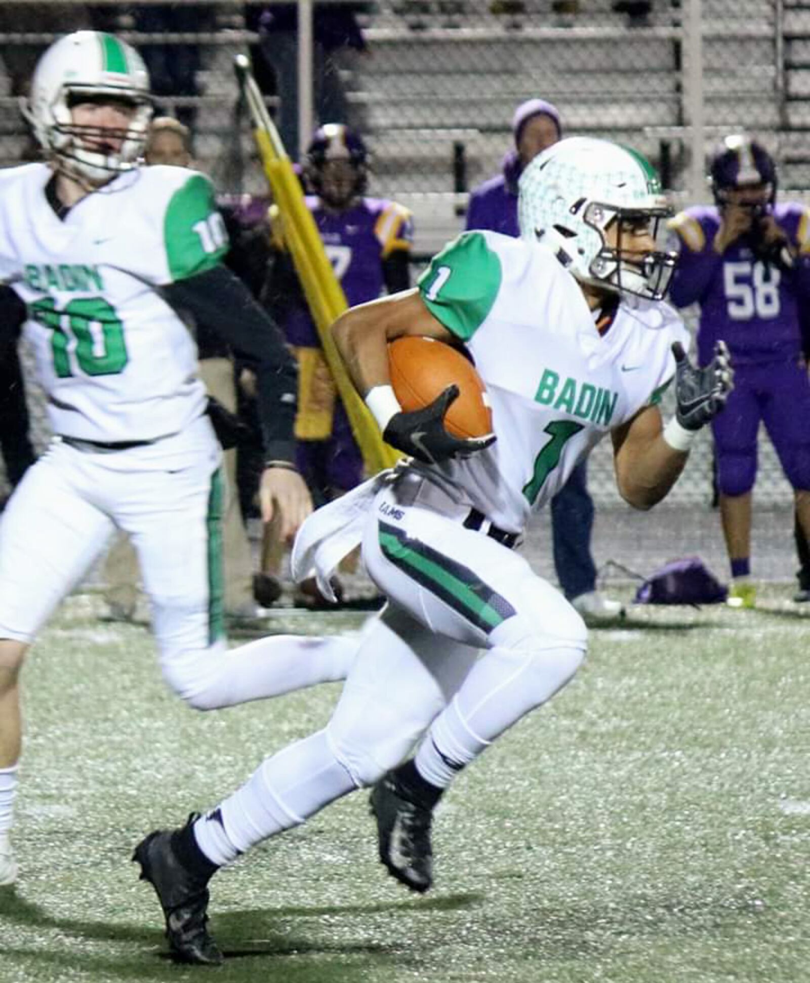 Badin's Davon Starks (1) heads down the field last Friday during a 33-22 win over Vandalia Butler in a Division III, Region 12 football playoff game at Memorial Field in Vandalia. CONTRIBUTED PHOTO BY TERRI ADAMS