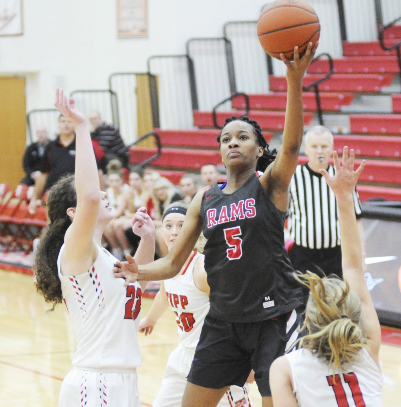 Trotwood’s Sha’mya Leigh (shooting) draws three Tipp defenders. Trotwood-Madison defeated host Tippecanoe 37-35 in girls high school basketball on Thursday, Jan. 24, 2019. MARC PENDLETON / STAFF