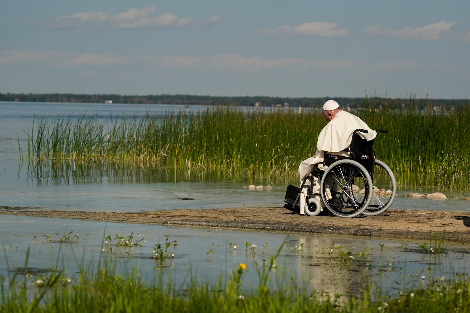 FILE - Pope Francis visits the Lac Ste. Anne pilgrimage site in Alberta, Canada, July 26, 2022. (AP Photo/Eric Gay, File)