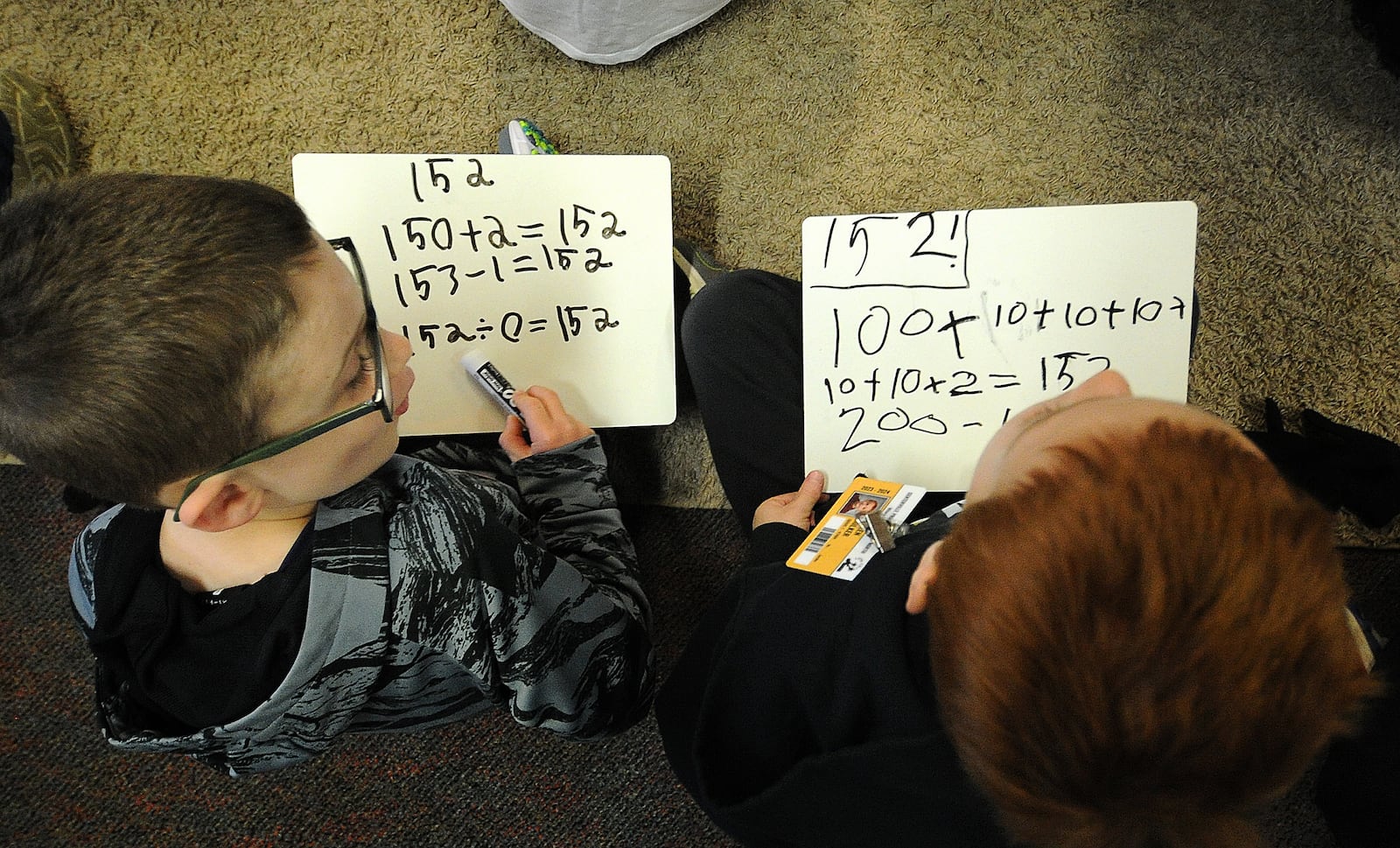 First grade students in Sarah Jacobs math class work on  addition and subtraction skills Monday, April 22, 2024 at the Primary Village North school in Centerville.  MARSHALL GORBY\STAFF