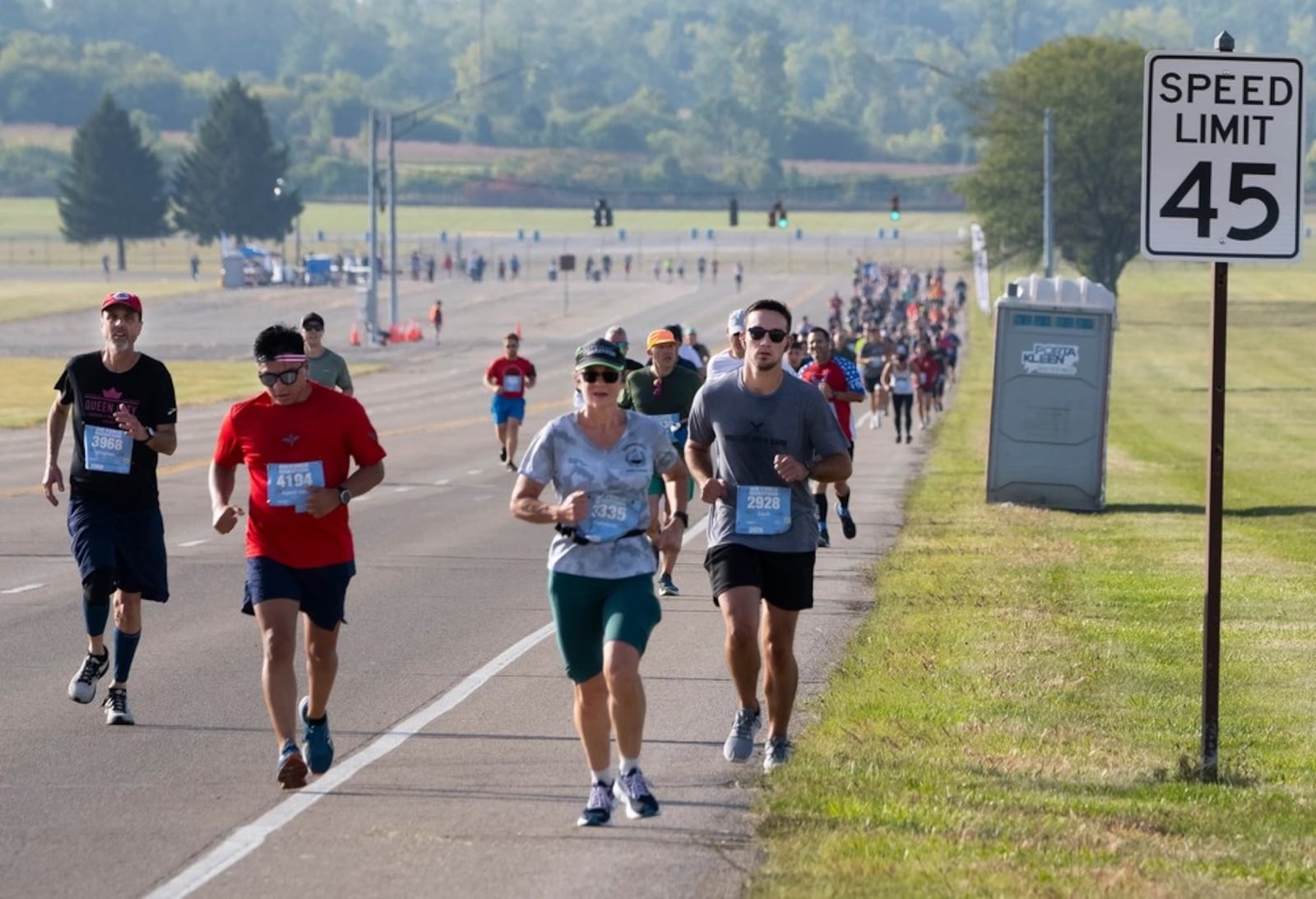 A line of runners stretches for miles across Wright-Patterson Air Force Base, and the local community as they take part in the 27th annual Air Force Marathon on Sept. 16, 2023.  (U.S. Air Force photo by R.J. Oriez)