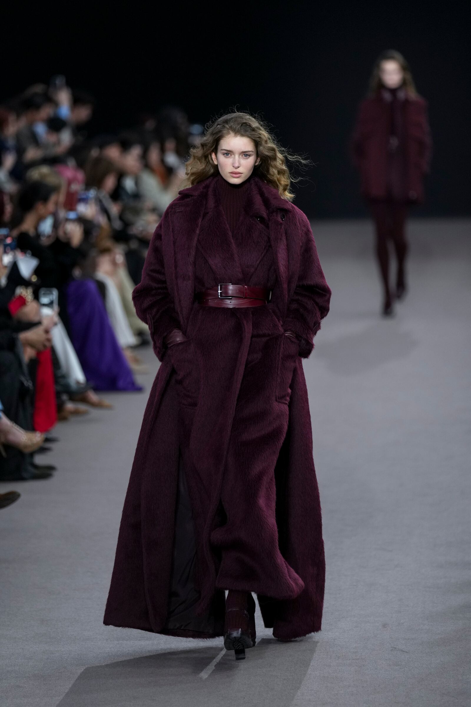 A model wears a creation as part of the Max Mara Fall/Winter 2025-2026 Womenswear collection presented in Milan, Italy, Thursday, Feb. 27, 2025. (AP Photo/Antonio Calanni)