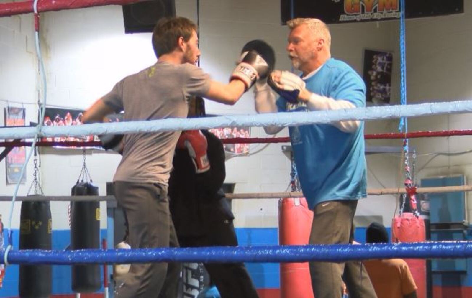 John Drake, owner of Drake’s Downtown Gym, and Darren Brown, of Dayton, boxing Monday, Jan. 4, 2016. Staff photo by Rachel Murray