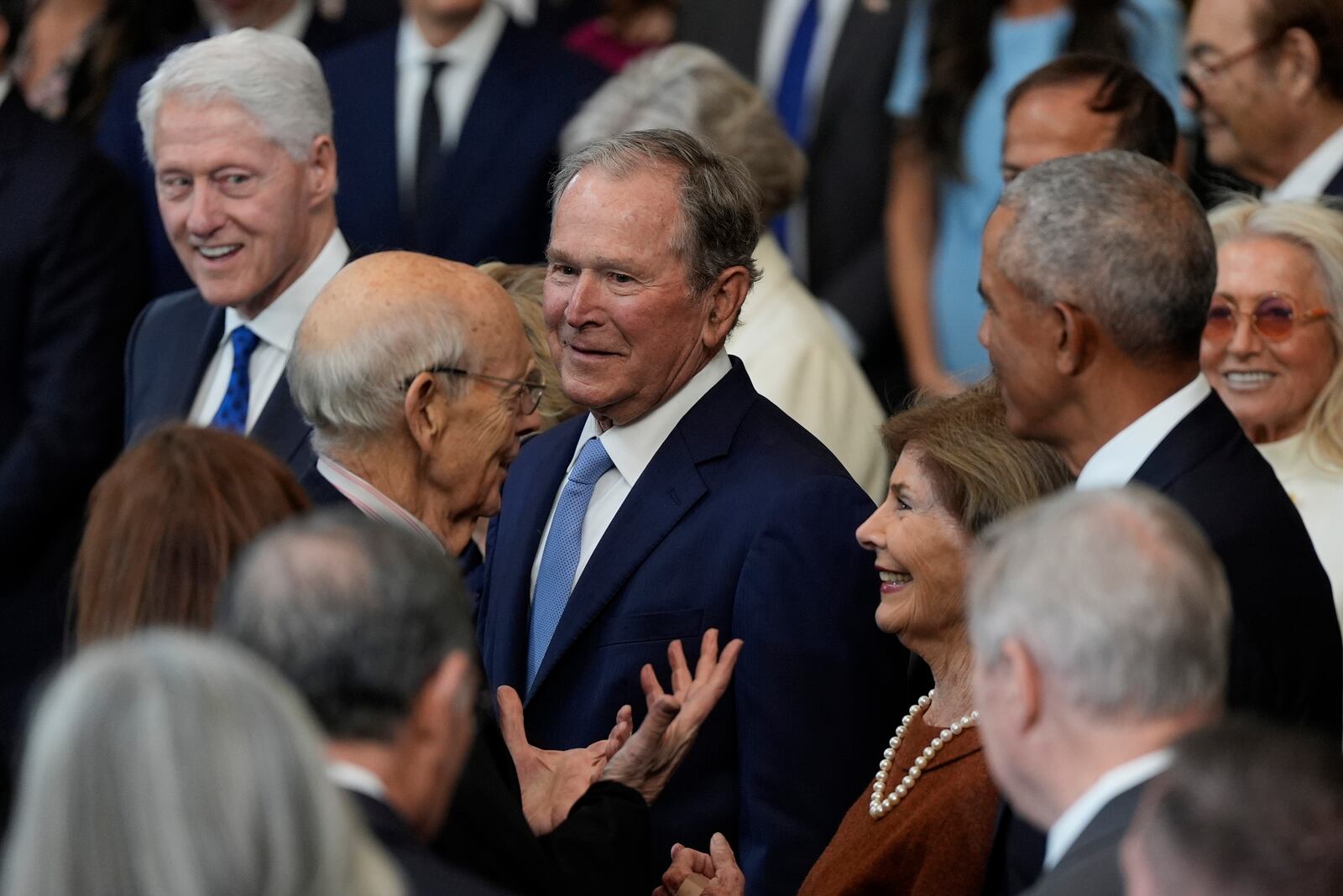 Retired Supreme Court Justice Stephen Breyer talks with Laura Bush as former President George W. Bush listens before the 60th Presidential Inauguration in the Rotunda of the U.S. Capitol in Washington, Monday, Jan. 20, 2025. (AP Photo/Julia Demaree Nikhinson, Pool)