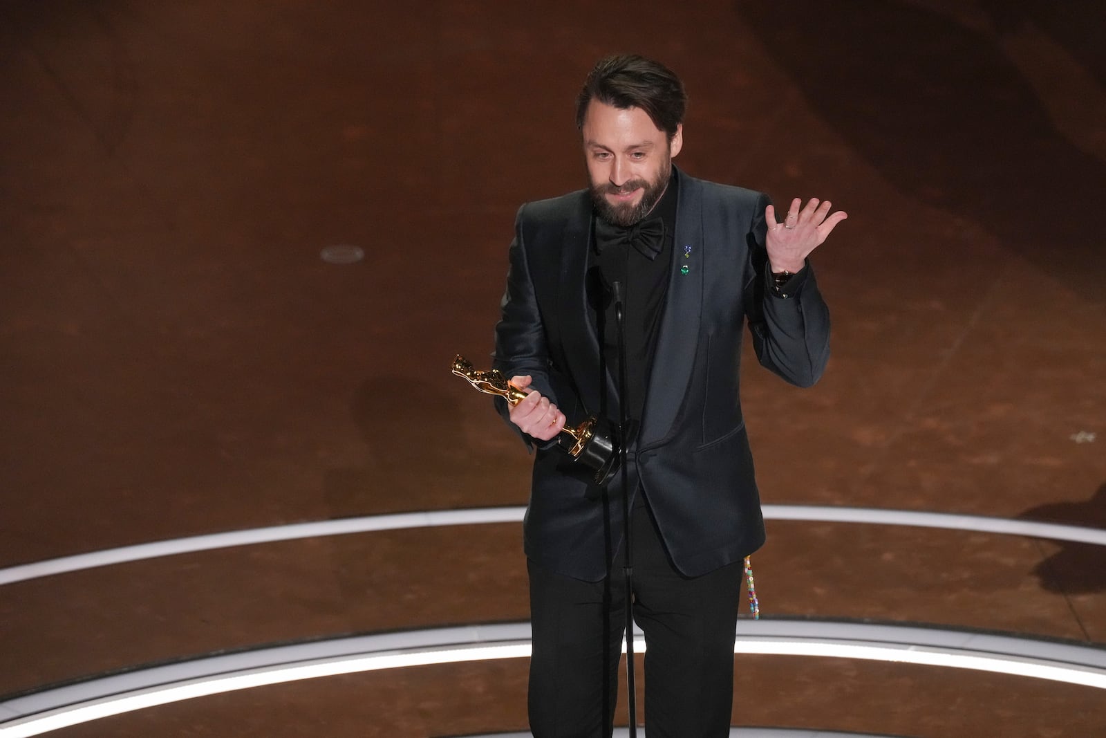 Kieran Culkin accepts the award for best performance by an actor in a supporting role for "A Real Pain" during the Oscars on Sunday, March 2, 2025, at the Dolby Theatre in Los Angeles. (AP Photo/Chris Pizzello)