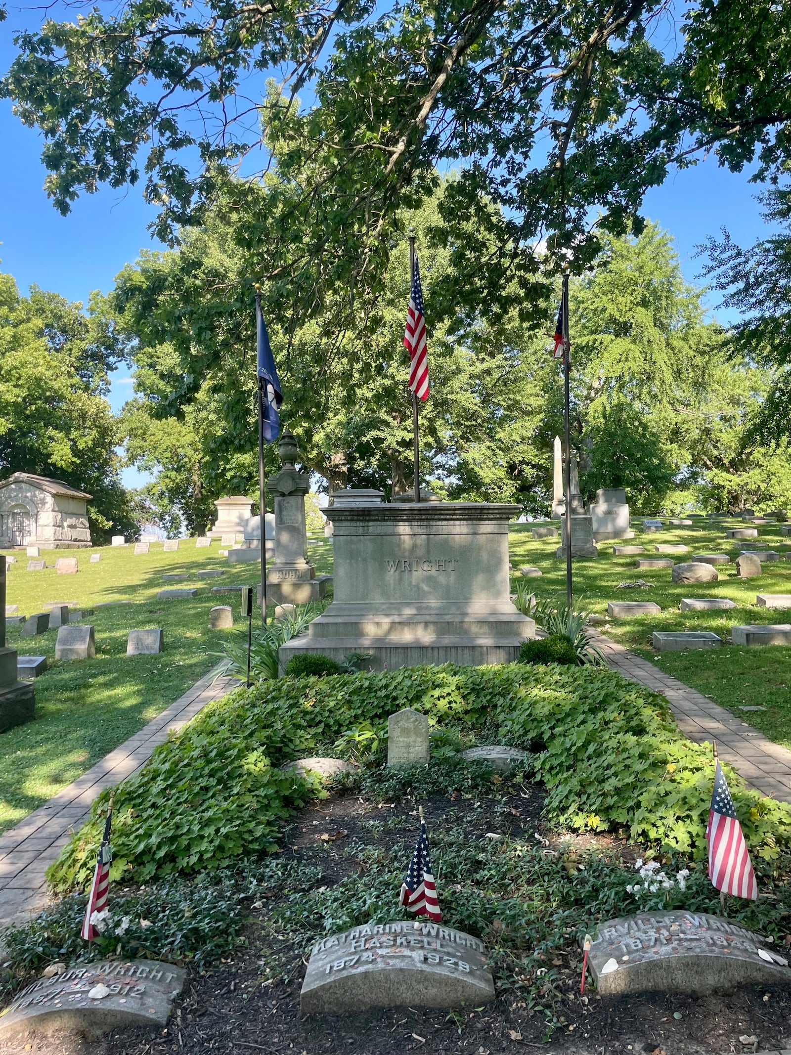 The graves of the Wright brothers and their sister Katharine are a frequent stop for Woodland Cemetery visitors. Photo by Debbie Juniewicz