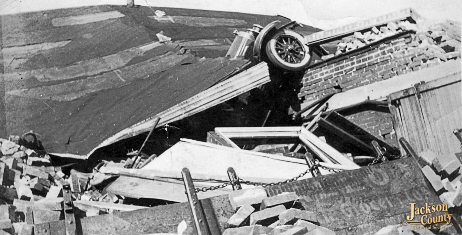 This photo provided by the Jackson County (Ill.) Historical Society shows the Chevrolet Buick Garage in Murphysboro, Ill., after a tornado tore through Indiana, Illinois, and Missouri in March 1925. (Jackson County (Ill.) Historical Society via AP)