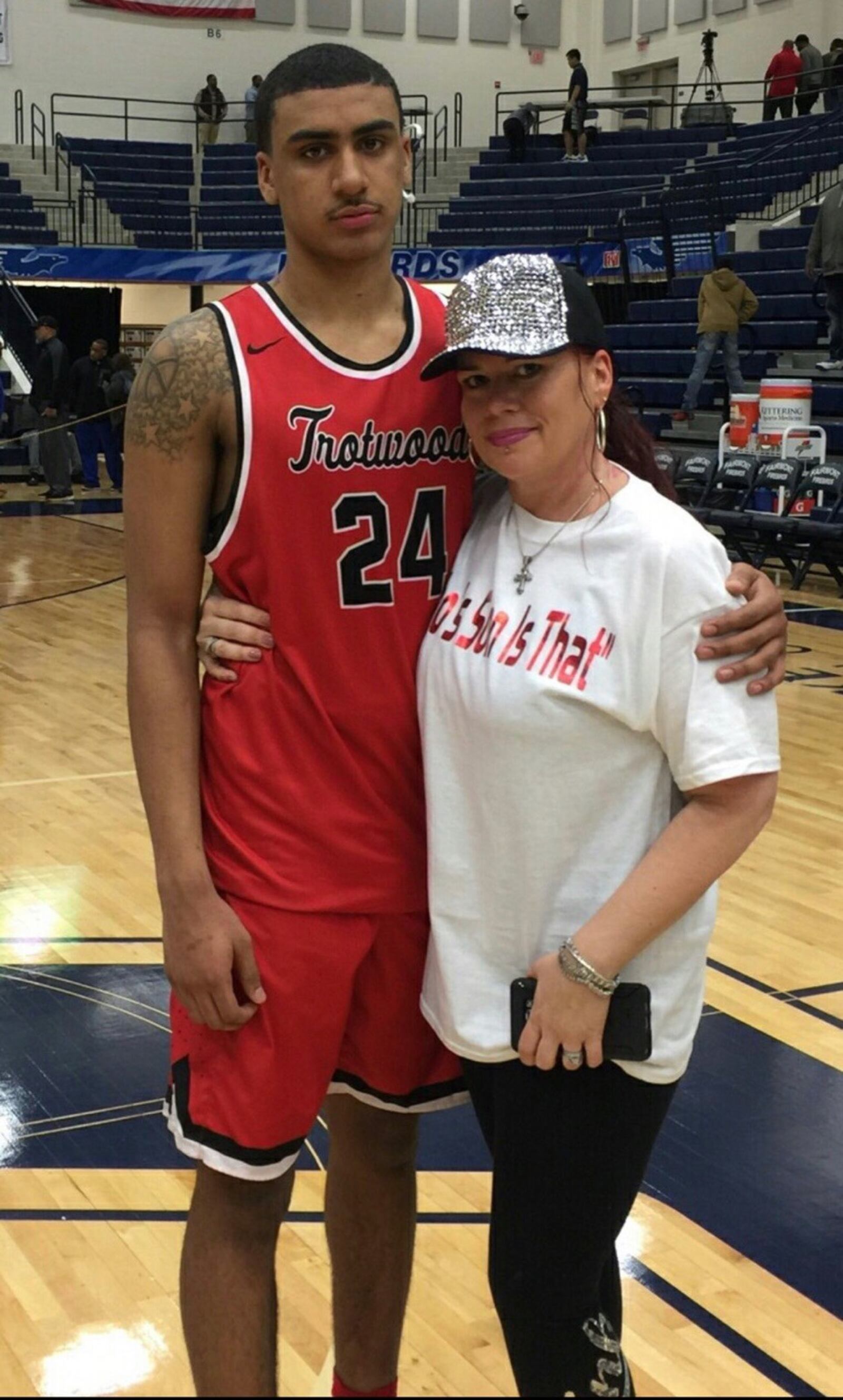 While a player at Trotwood Madison High, Torrey Patton embraces his mom, Conswela McLemore, who is wearing a shirt that proclaimed’ “Whose Son is That” It’s her favorite saying when Torrey does well. She’s said it a lot this season.   CONTRIBUTED