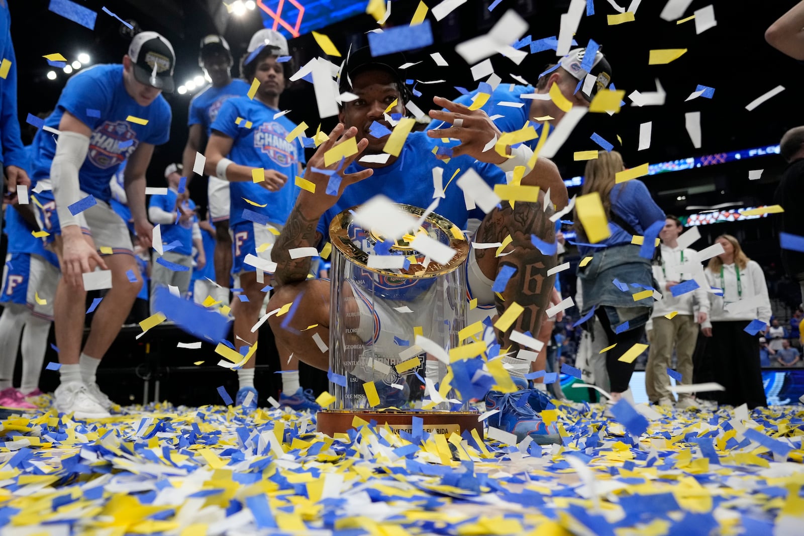 Florida guard Alijah Martin and team celebrate victory over Tennessee after an NCAA college basketball game in the final round of the Southeastern Conference tournament, Sunday, March 16, 2025, in Nashville, Tenn. (AP Photo/George Walker IV)