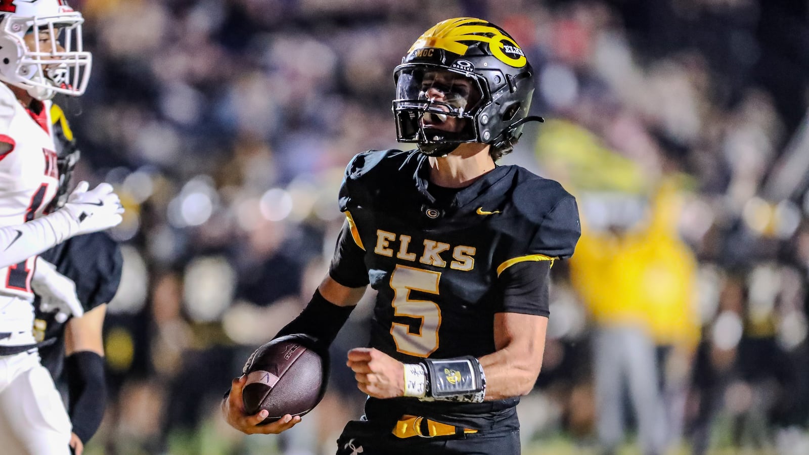 Centerville High School junior Shane Cole celebrate as he  runs the ball into the end zone during their game against Wayne on Friday night at Centerville Stadium. The Elks won 38-14. CONTRIBUTED PHOTO BY MICHAEL COOPER