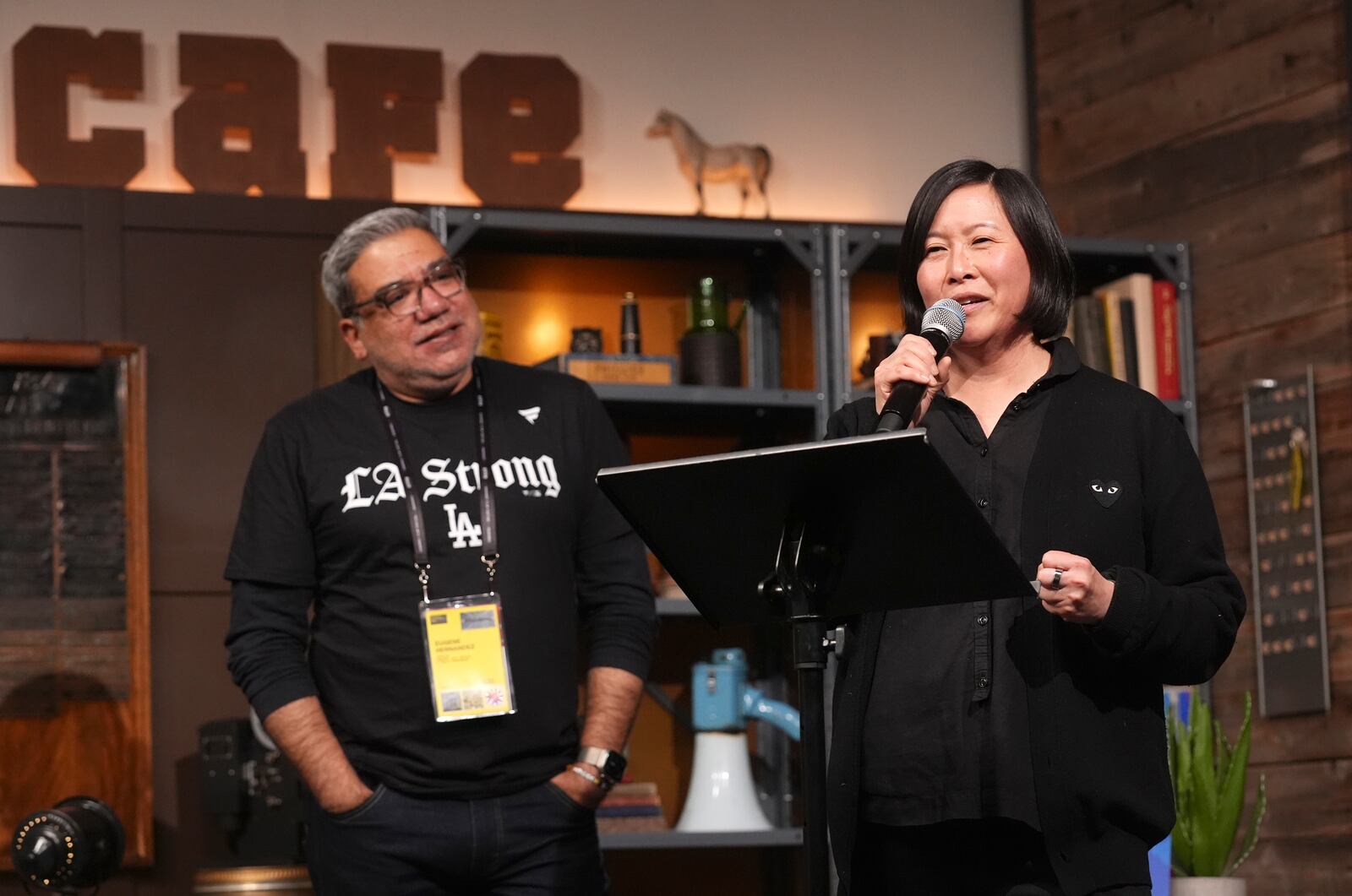 Kim Yutani, right, director of programming of the Sundance Film Festival, addresses reporters as festival director Eugene Hernandez looks on at a news conference before the 2025 Sundance Film Festival on Wednesday, Jan. 22, 2025, in Park City, Utah. (AP Photo/Chris Pizzello)