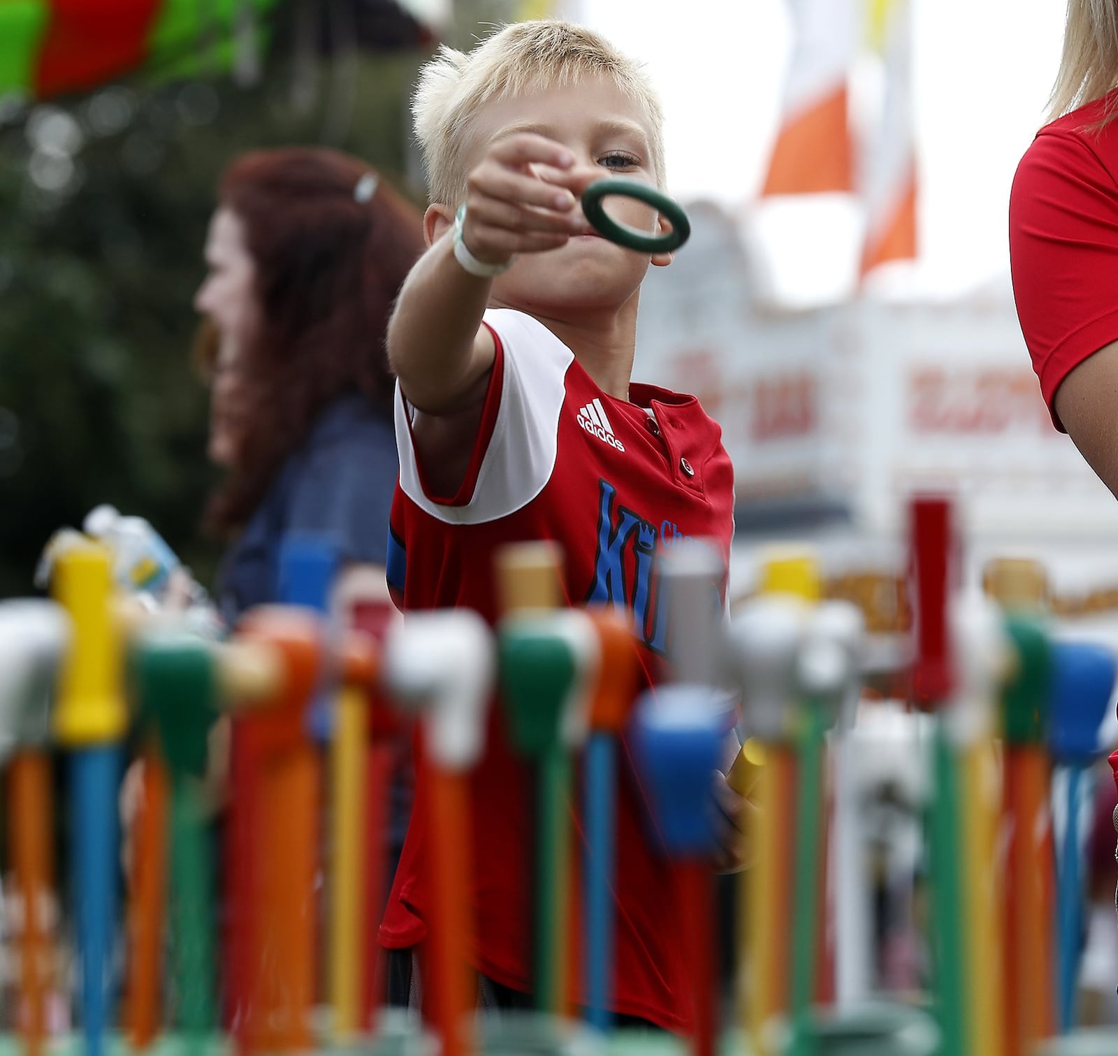 A ring-toss game on the midway at the Champaign County Fair. BILL LACKEY/STAFF