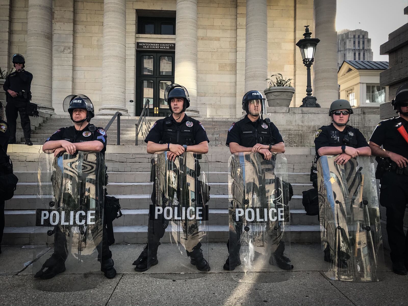 Dayton police at Courthouse Square, just before the 7 p.m. curfew Sunday, May 31, 2020. JIM NOELKER / STAFF