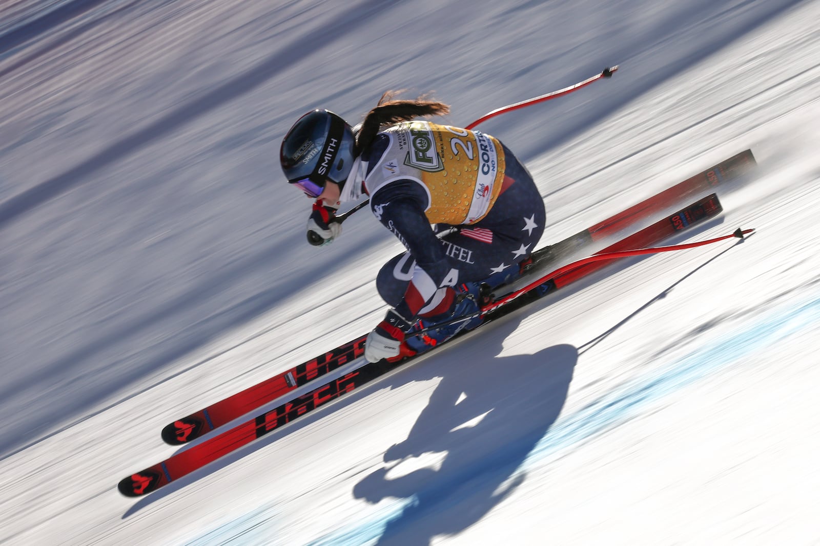 United States' Jacqueline Wiles speeds down the course during an alpine ski, women's World Cup downhill training, in Cortina d'Ampezzo, Italy, Friday, Jan. 17, 2025. (AP Photo/Marco Trovati)