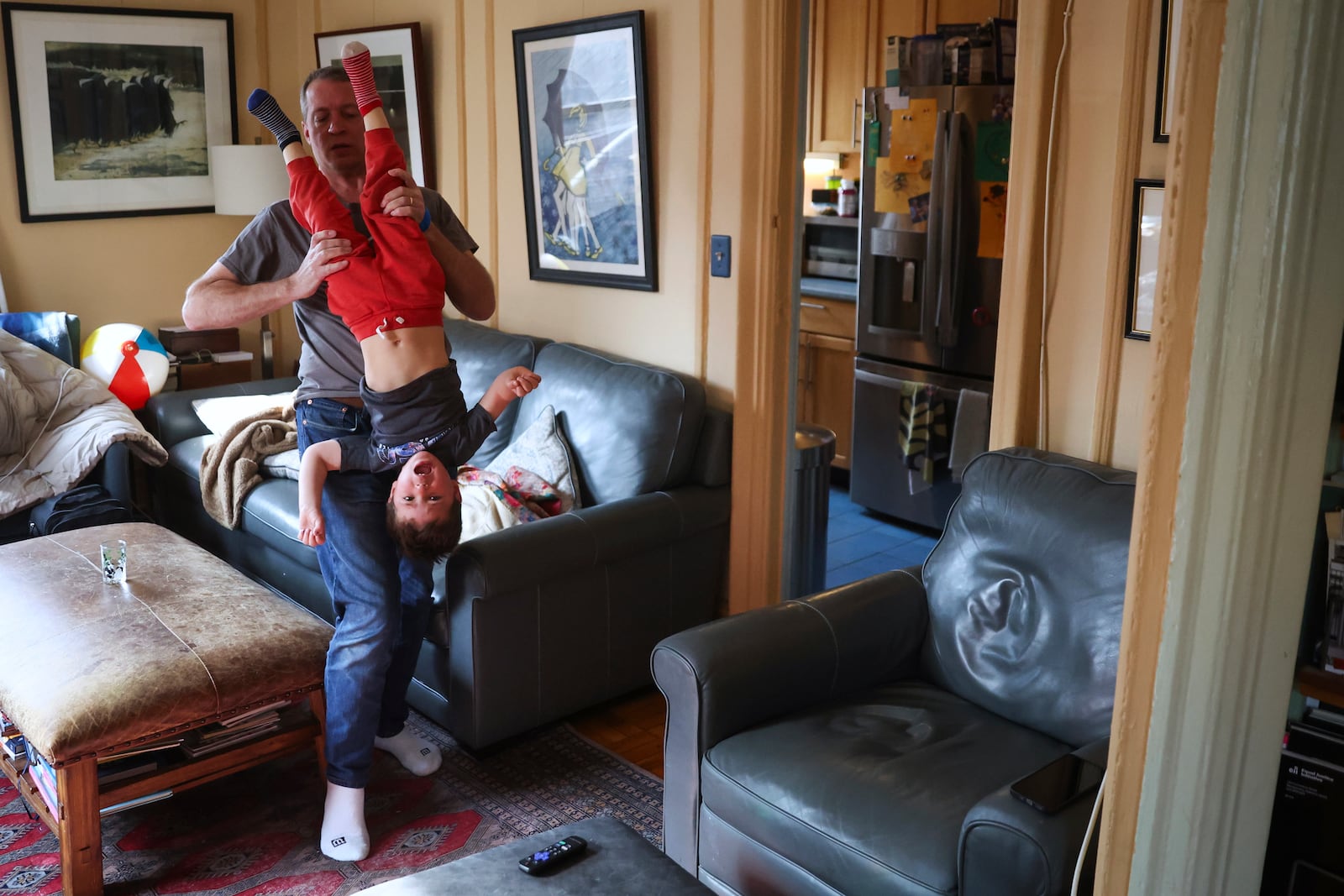 Jake Heinrichs plays with his 3-year-old son, Sam, after his infusion treatment with an experimental anti-amyloid Alzheimer's drug in New York, on Wednesday, March 12, 2025. (AP Photo/Heather Khalifa)