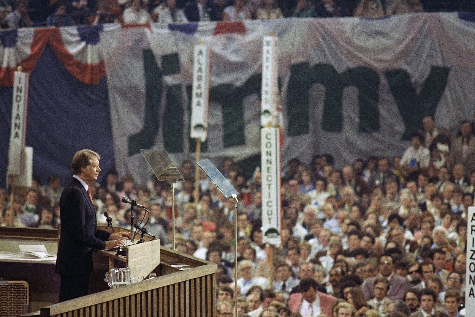 FILE - Jimmy Carter gives his acceptance speech after accepting the Democratic nomination for president on the convention floor, July 15, 1976, at New York's Madison Square Garden. (AP Photo, File)