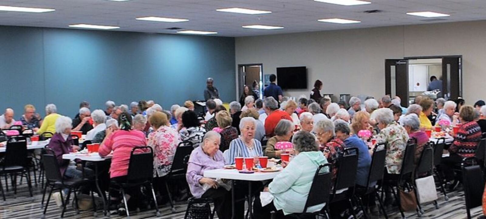 A large crowd eats lunch in the cafeteria at the Xenia Adult Recreation and Services Center. CONTRIBUTED