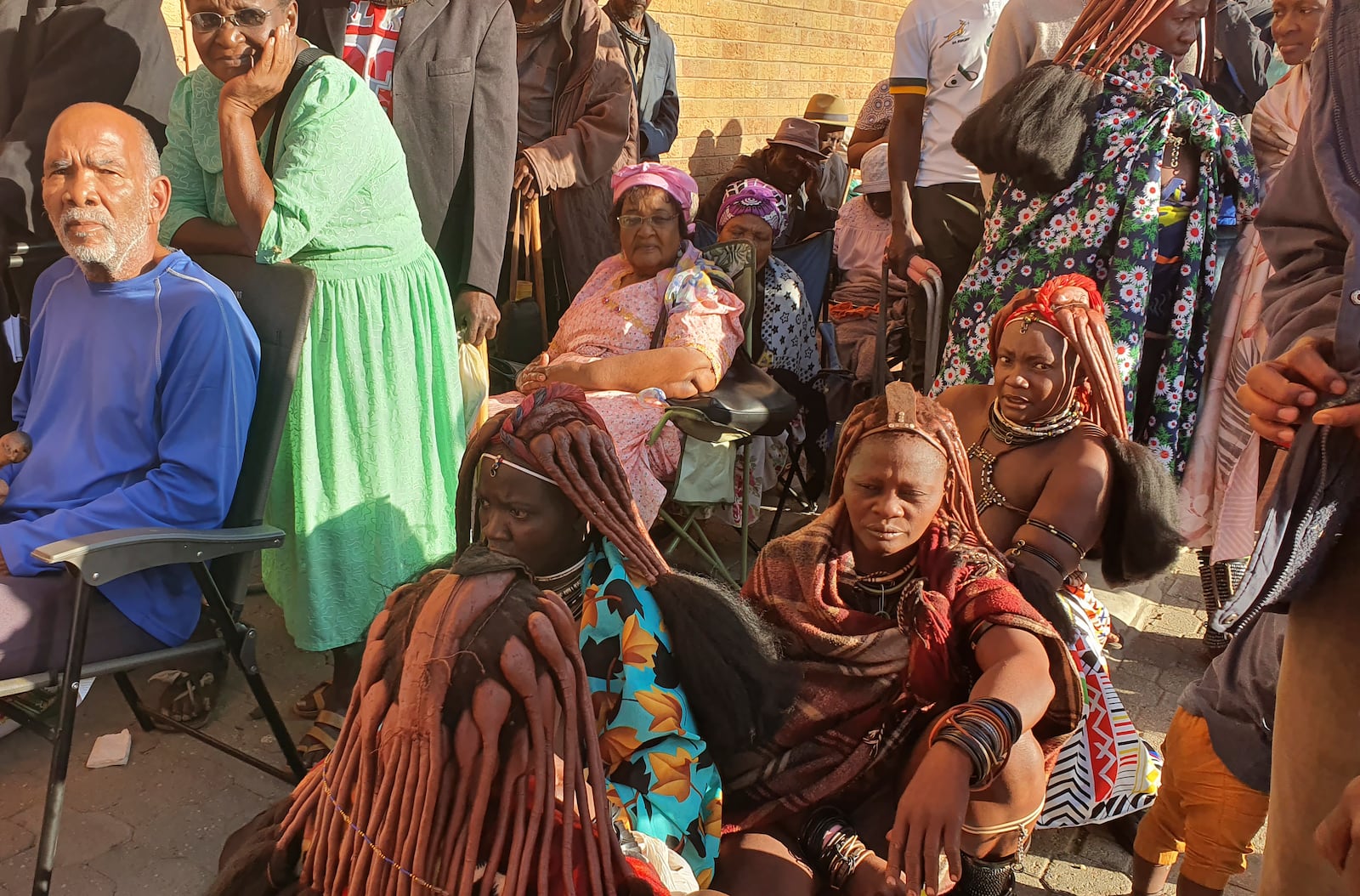 Namibians queue to cast their votes in a presidential election in Windhoek, Namibia Wednesday, Nov. 27, 2024. (AP Photo/Dirk Heinrich)