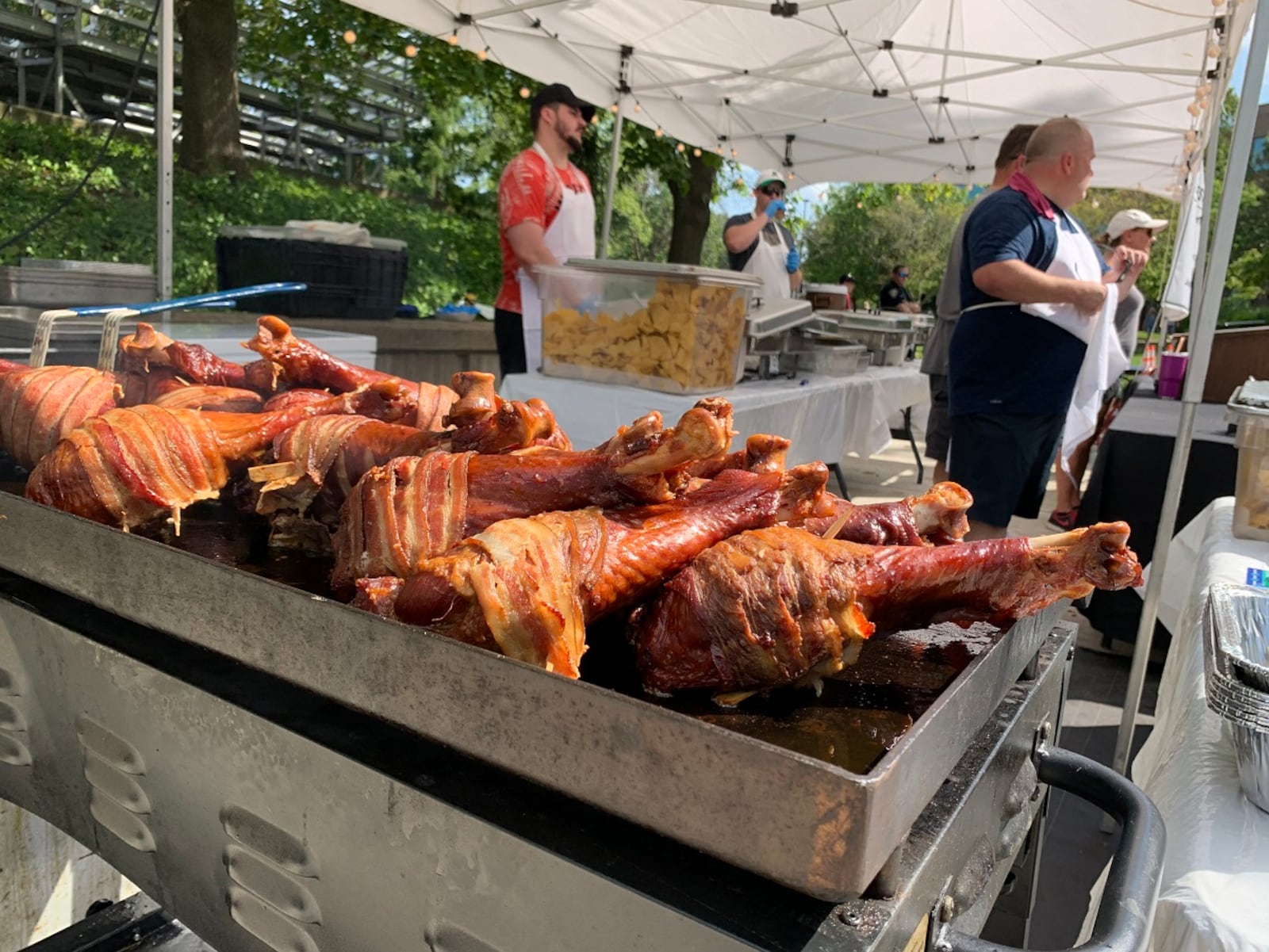 Delicious dishes served at Bacon Fest at Kettering Fraze Pavilion on Saturday, Aug. 28, included pulled pork bacon nachos, bacon banana cream pudding, bacon wrapped turkey legs and Cuban sandwiches. CONTRIBUTED/ALEXIS LARSEN