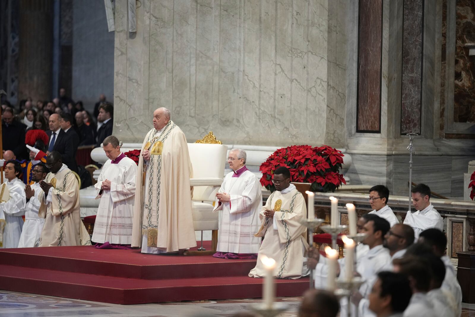 Pope Francis presides over a mass in St. Peter's Basilica at The Vatican on New Year's Day, Wednesday, Jan. 1, 2025. (AP Photo/Andrew Medichini)